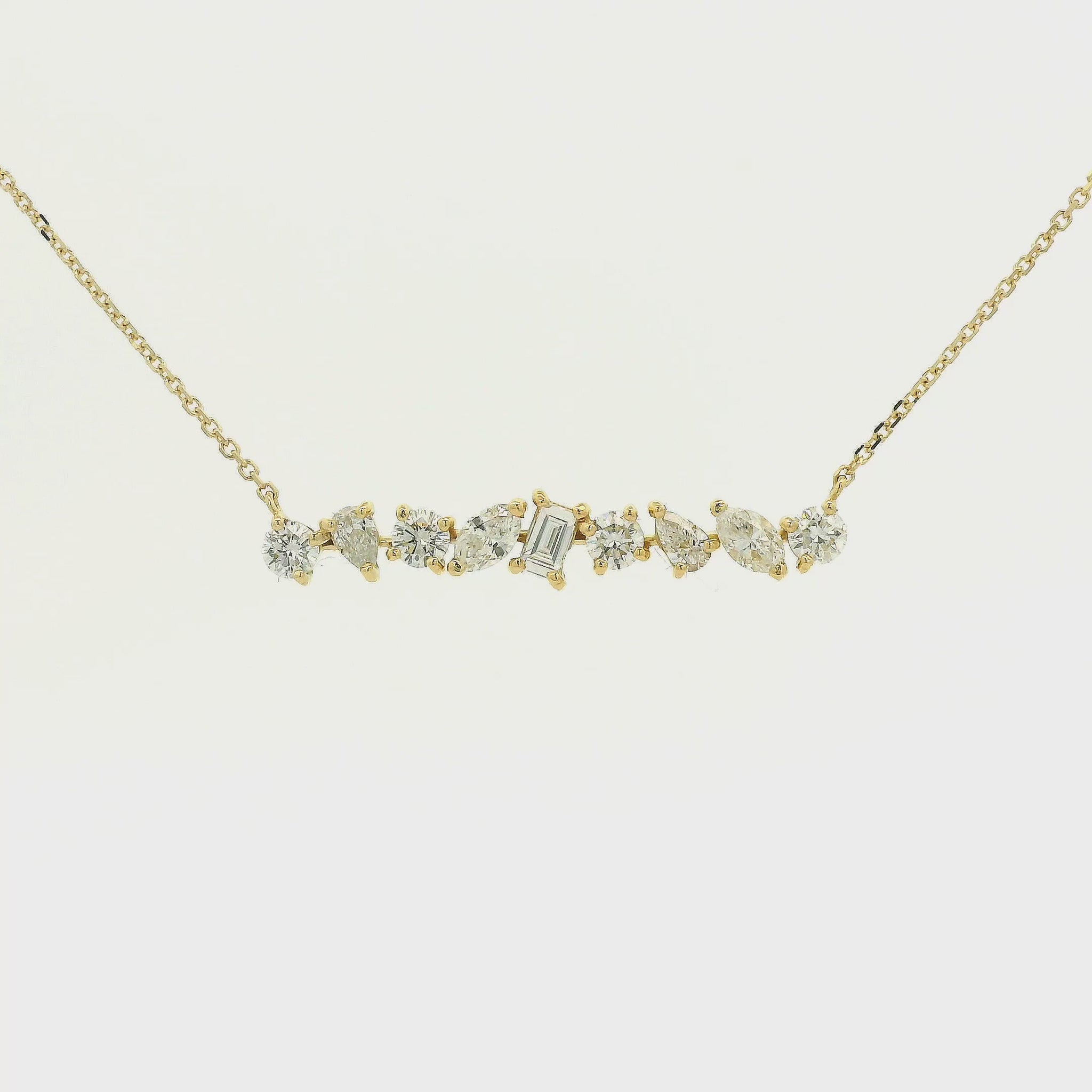 A Yellow Gold Bar Pendant with round, pear, marquise & emerald cut Diamonds at Forever Rox Fine Jewelry, Lake Tahoes Best Jewelry Store
