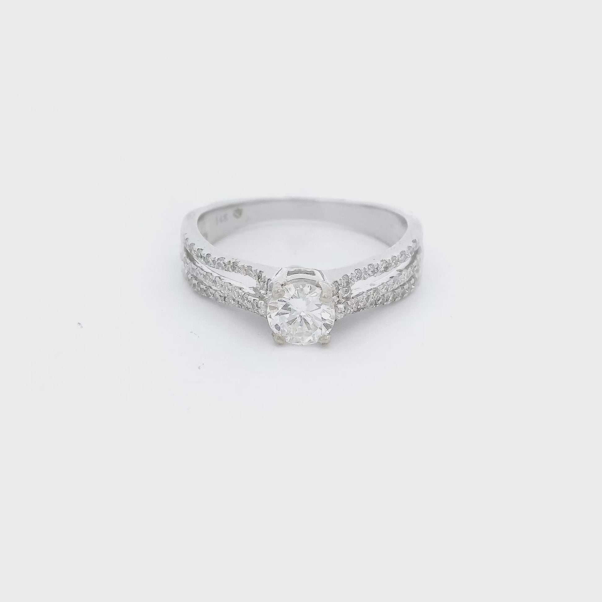 Round cut diamond set in a triple split white gold diamond setting at Forever Rox Fine Jewelry 