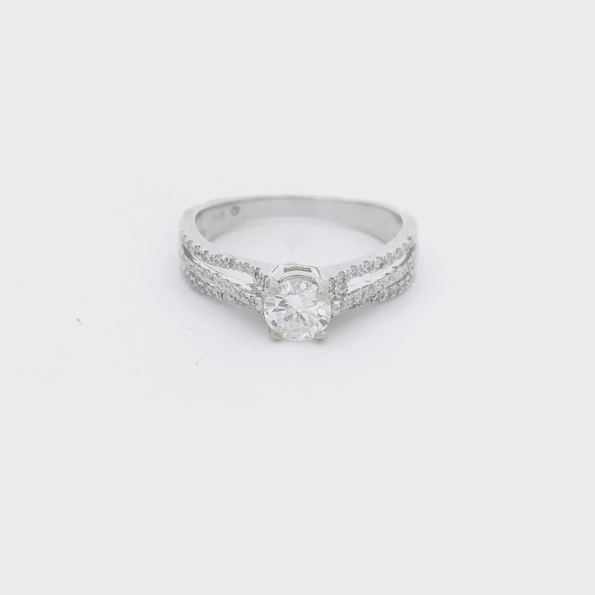 Round cut diamond set in a triple split white gold diamond setting at Forever Rox Fine Jewelry 
