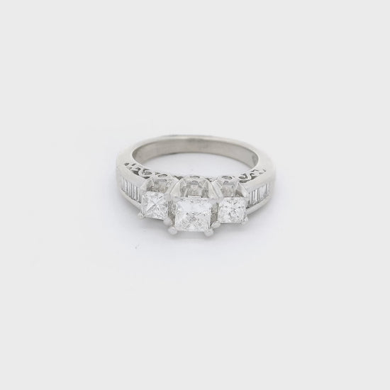 3 Princess cut diamonds and baguette diamonds set in a white gold ring at Forever Rox Fine Jewelry