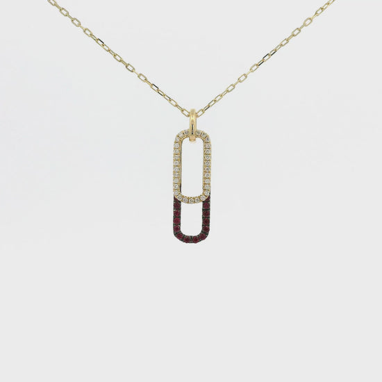 A Yellow Gold Pendant with two ovals, one with Natural Rubies and the other with Natural Diamonds at Forever Rox Fine Jewelry, Lake Tahoes Best Jewelry Store