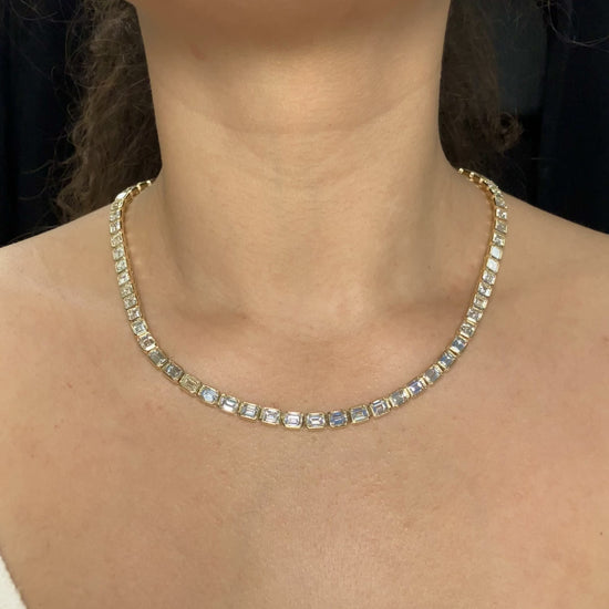 A Yellow Gold Tennis Necklace with bezel set emerald cut natural Diamonds all the way around at Forever Rox Fine Jewelry, Lake Tahoes Best Jewelry Store