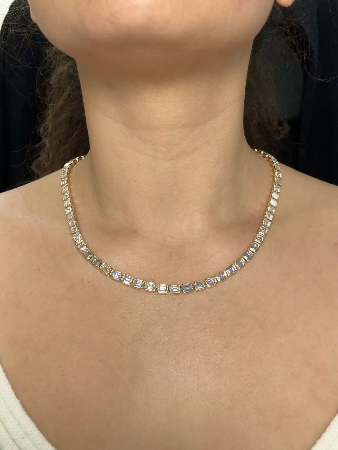 A Yellow Gold Tennis Necklace with bezel set emerald cut natural Diamonds all the way around at Forever Rox Fine Jewelry, Lake Tahoes Best Jewelry Store