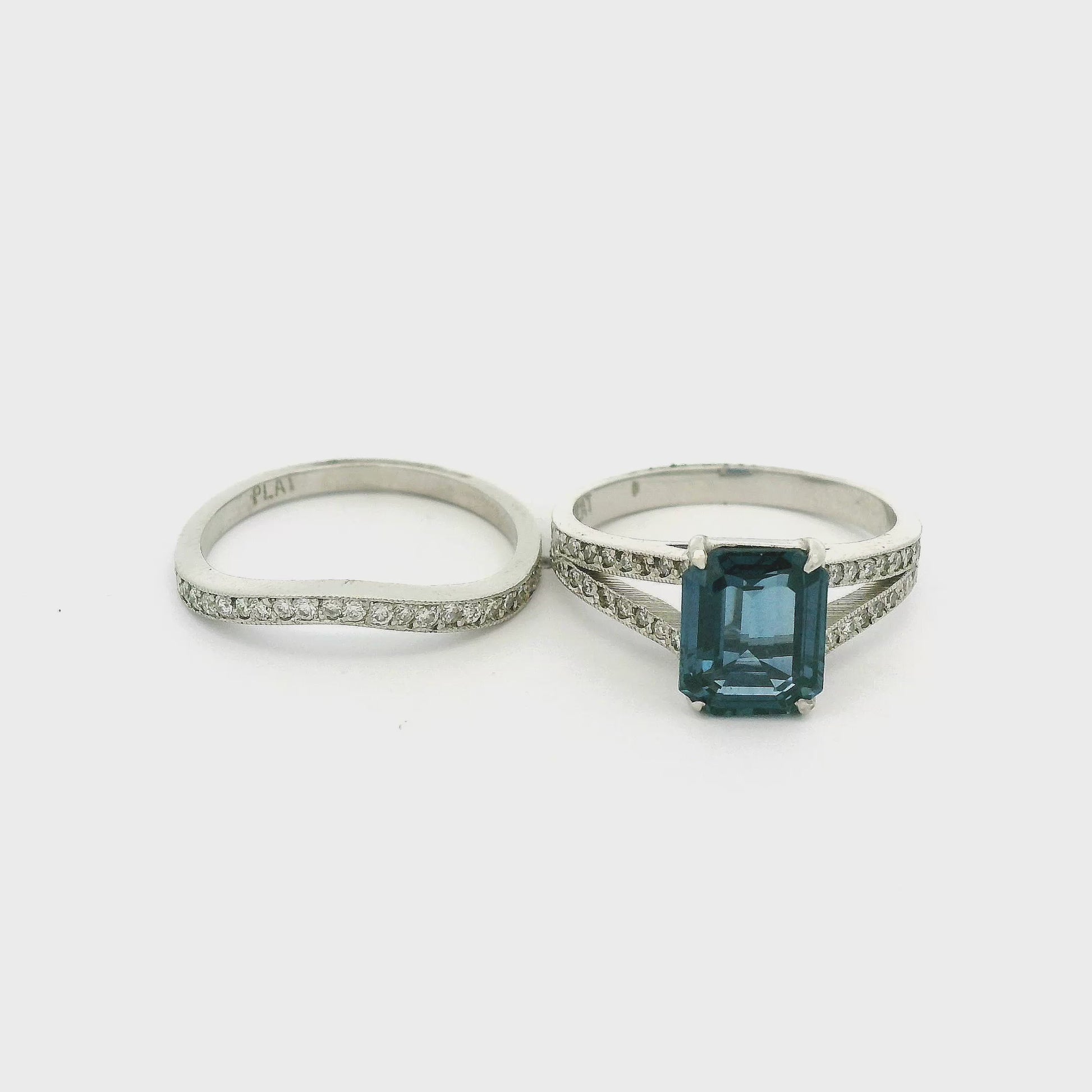 Two white gold rings, 1 emerald cut sapphire & diamond ring and one diamond matching wedding band at Forever Rox Fine Jewelry