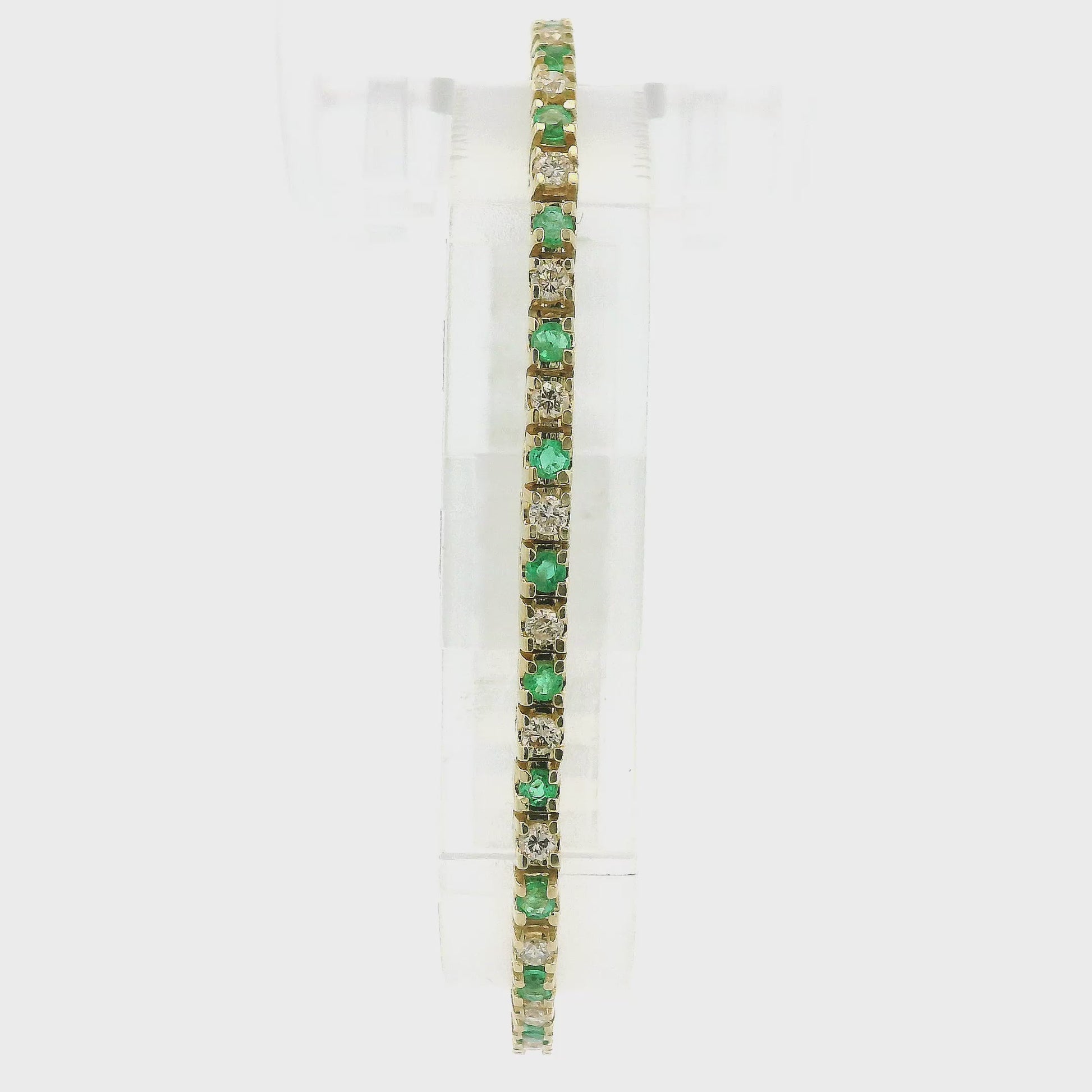 A Yellow Gold Tennis Bracelet with round cut natural Diamonds & Emeralds alternating all the way around at Forever Rox Fine Jewelry, Lake Tahoes Best Jewelry Store