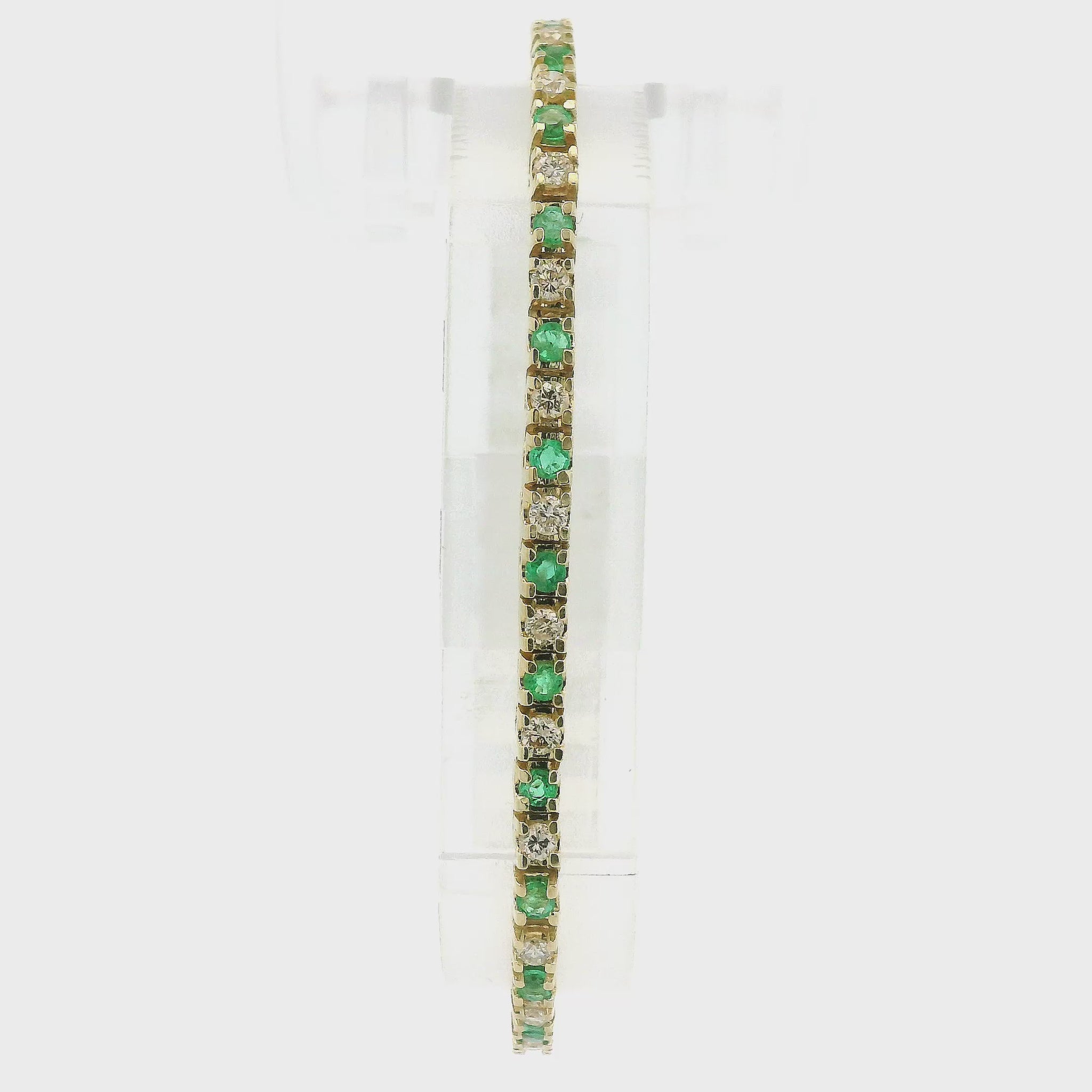 A Yellow Gold Tennis Bracelet with round cut natural Diamonds & Emeralds alternating all the way around at Forever Rox Fine Jewelry, Lake Tahoes Best Jewelry Store