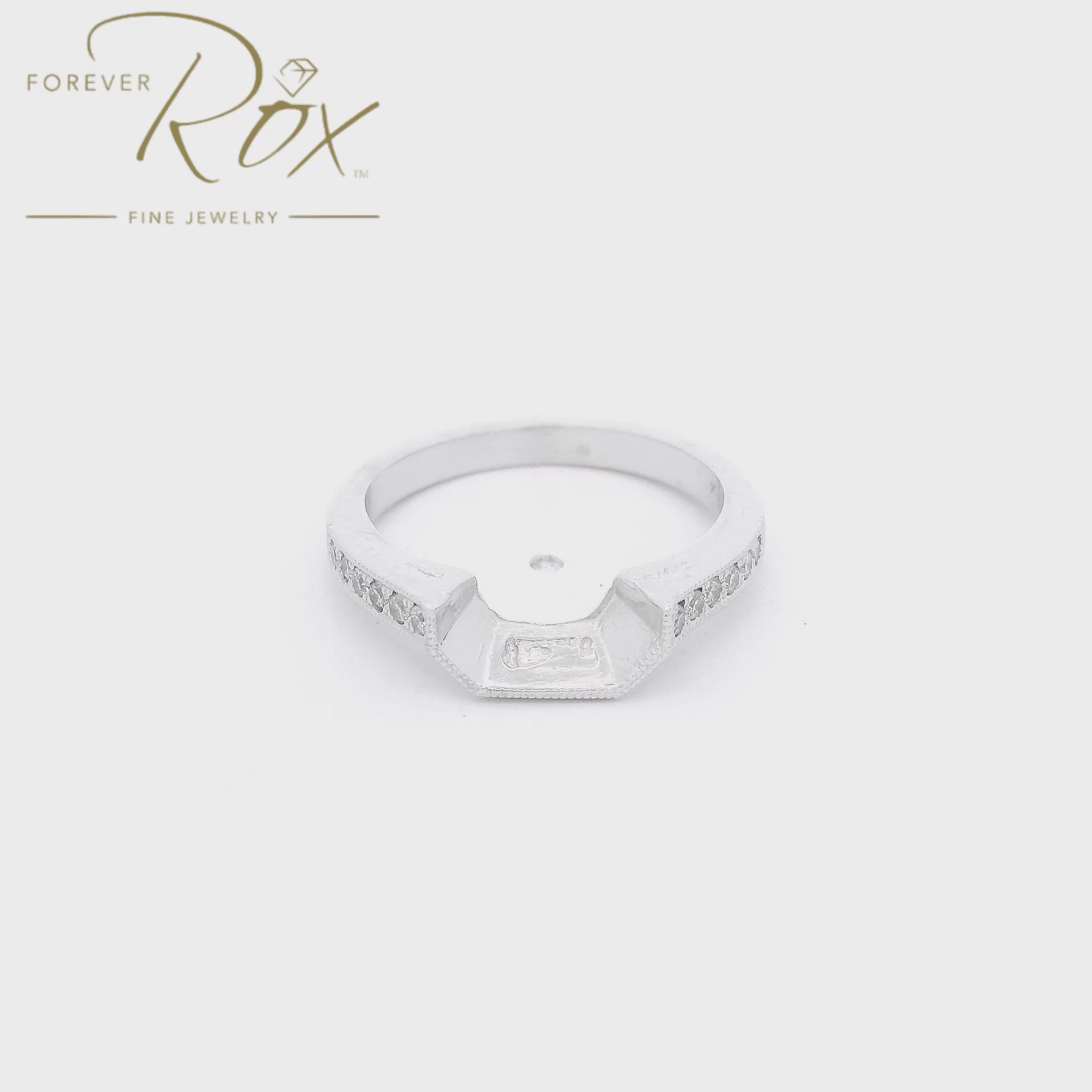 A White Gold Tracer Band with channel set round cut natural Diamonds down the side and ilgrain design at Forever Rox Fine Jewelry, Lake Tahoes Best Jewelry Store