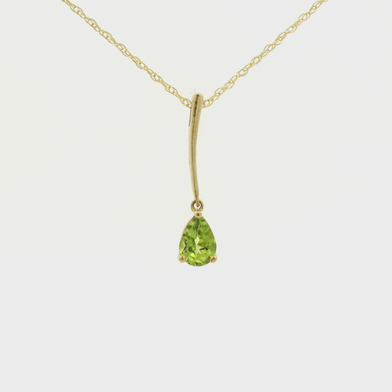 Yellow Gold Dangle Pendant with a prong set pear cut natural Peridot at Forever Rox Fine Jewelry, Lake Tahoes Best Jewelry Store
