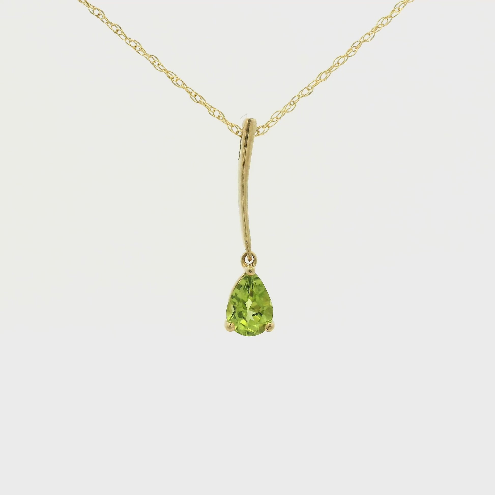 Yellow Gold Dangle Pendant with a prong set pear cut natural Peridot at Forever Rox Fine Jewelry, Lake Tahoes Best Jewelry Store
