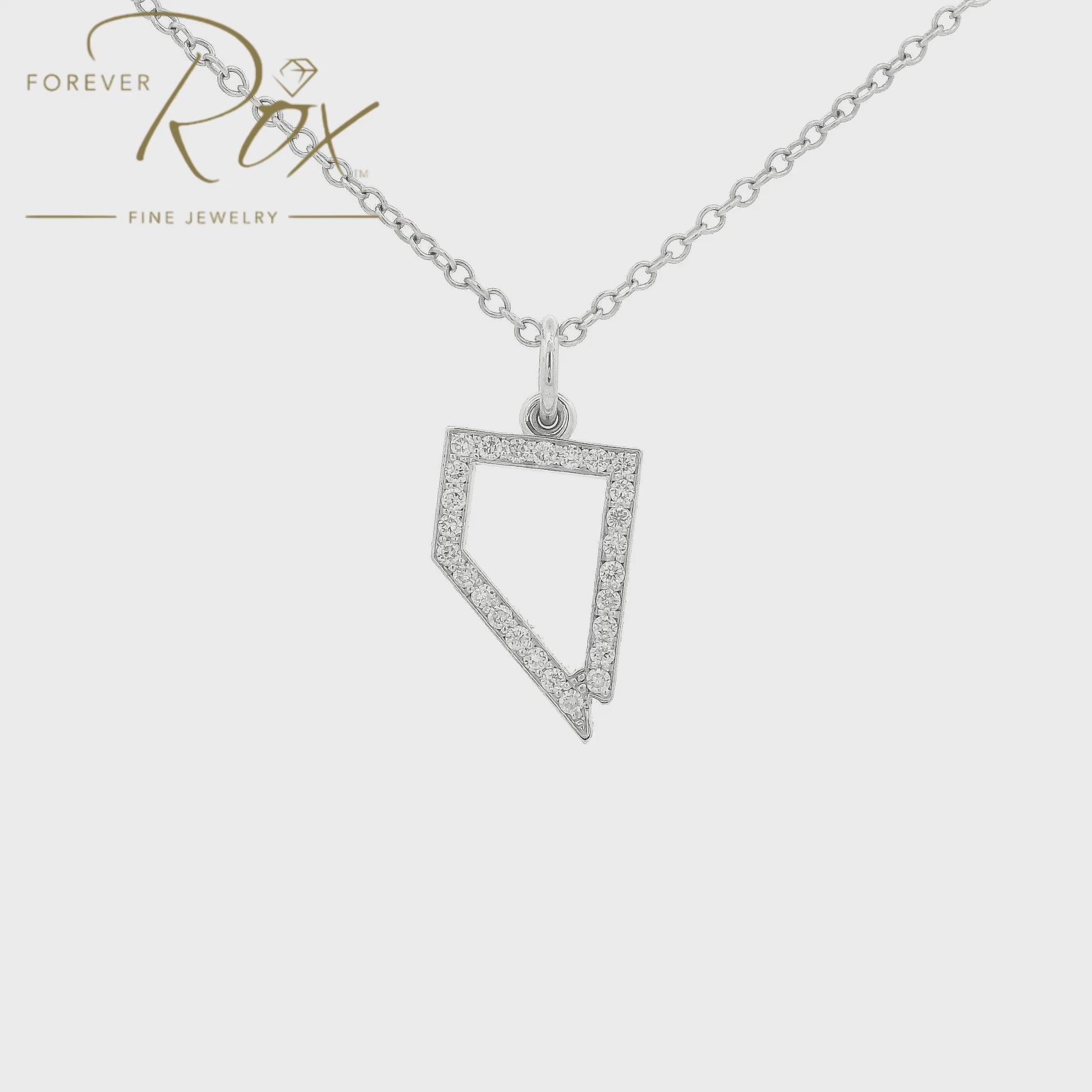 A White GoldNevada Outline Pendant with diamonds all the way around at Forever Rox Fine Jewelry, Lake Tahoes Best Jewelry Store
