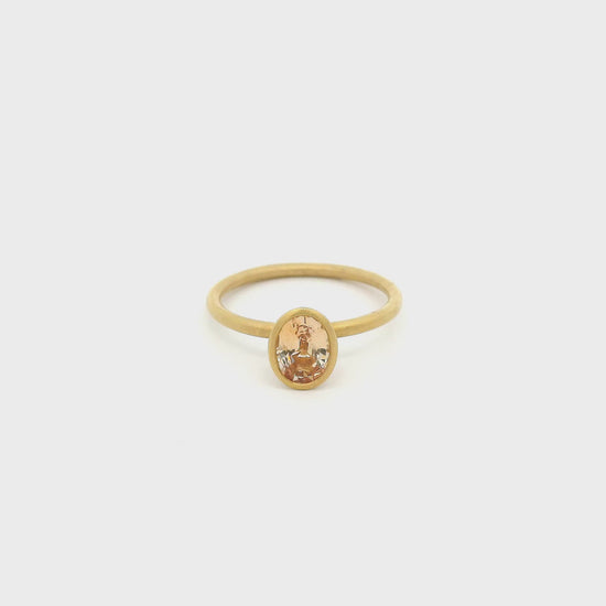 A Yellow Gold Ring with a bezel set fancy cut natural Sapphire in the center with a chain attached at Forever Rox Fine Jewelry, Lake Tahoes Best Jewelry Store