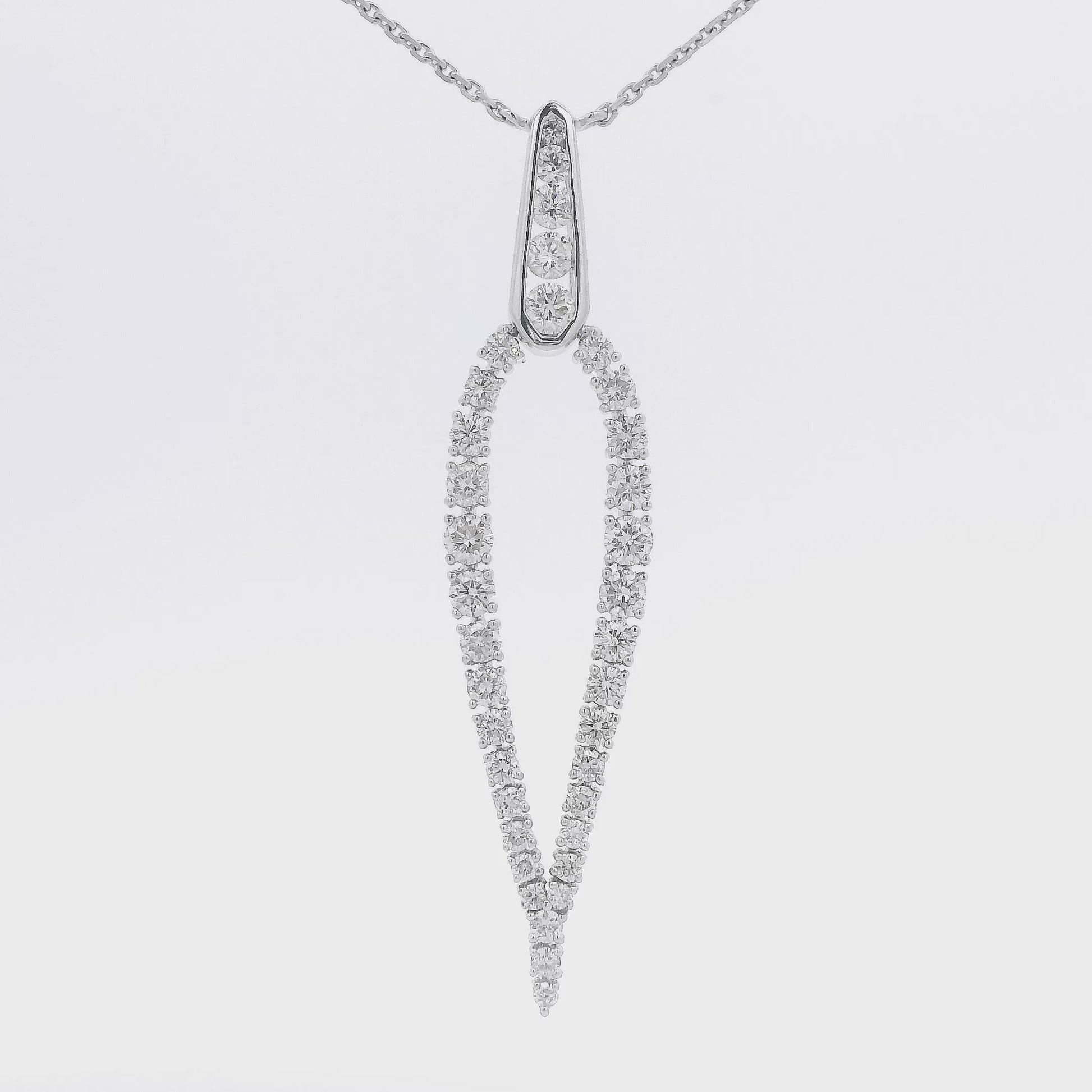 A White Gold Tear Drop Shape Pendant with Diamonds prong and bezel set all around at Forever Rox Fine Jewelry, Lake Tahoes Best Jewelry Store