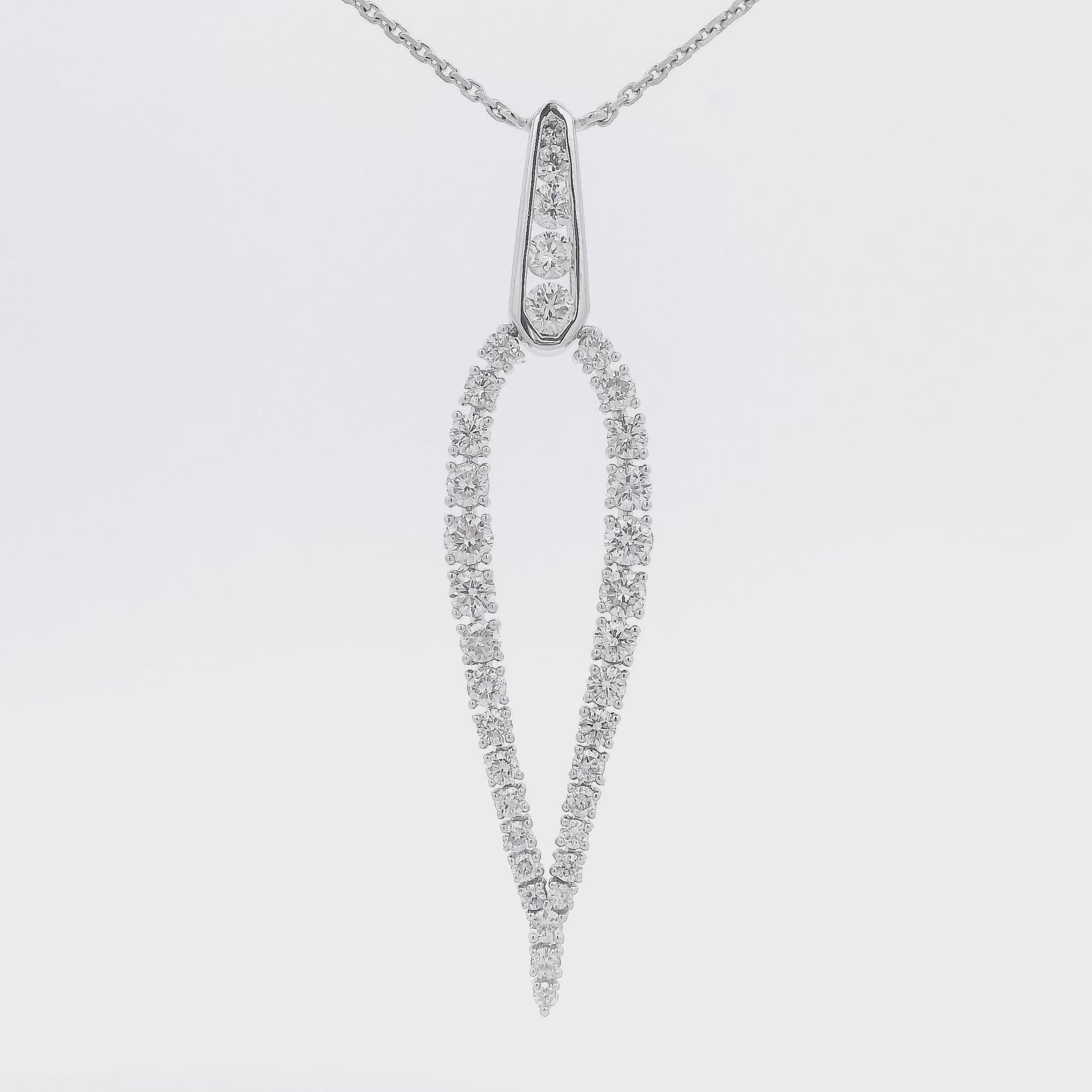 A White Gold Tear Drop Shape Pendant with Diamonds prong and bezel set all around at Forever Rox Fine Jewelry, Lake Tahoes Best Jewelry Store
