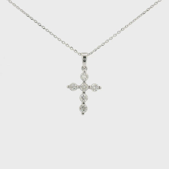A White Gold Cross Pendant with 6 round cut Diamonds at Forever Rox Fine Jewelry, Lake Tahoes Best Jewelry Store