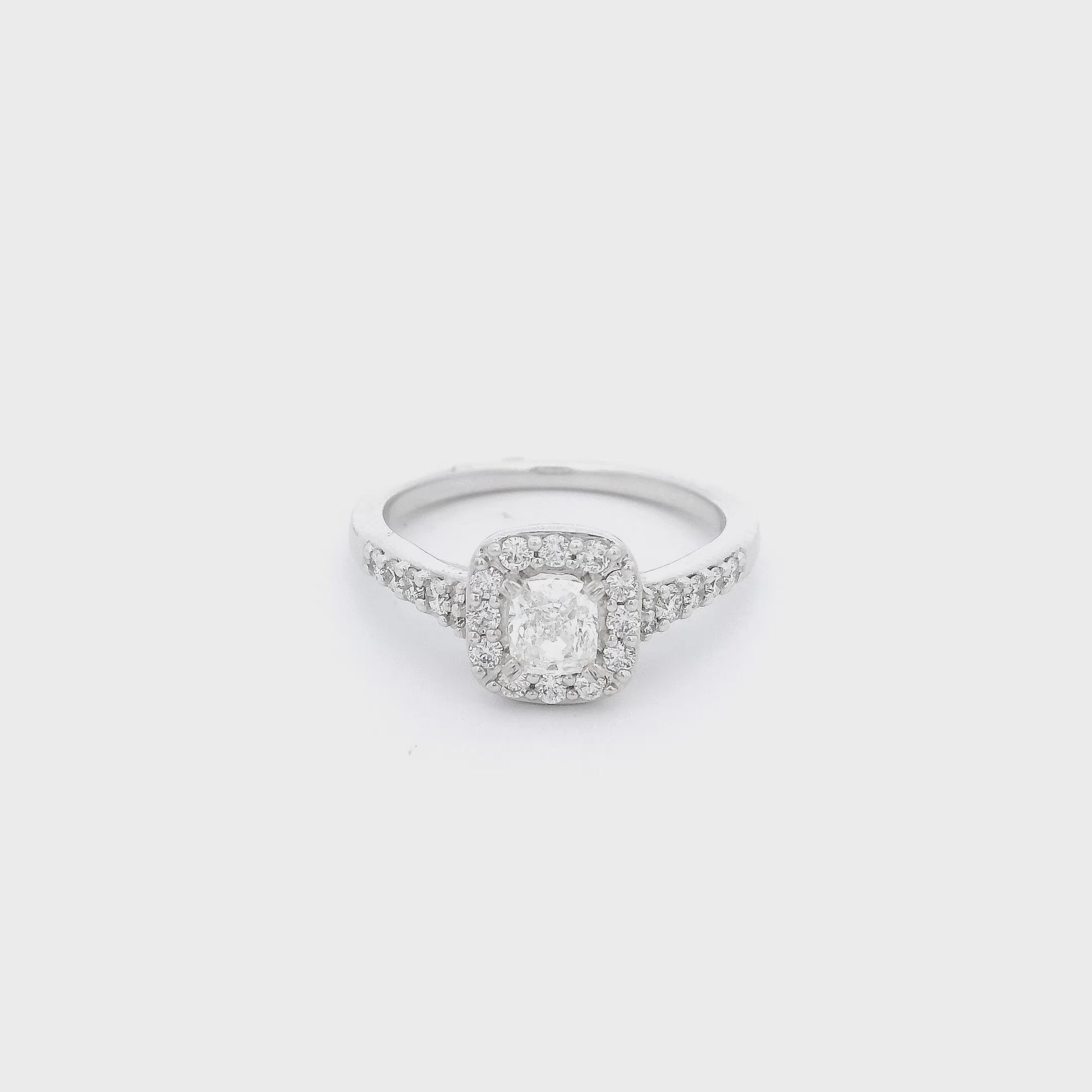 Cushion Cut Diamond set in white gold with diamond accents at Forever Rox Fine Jewelry