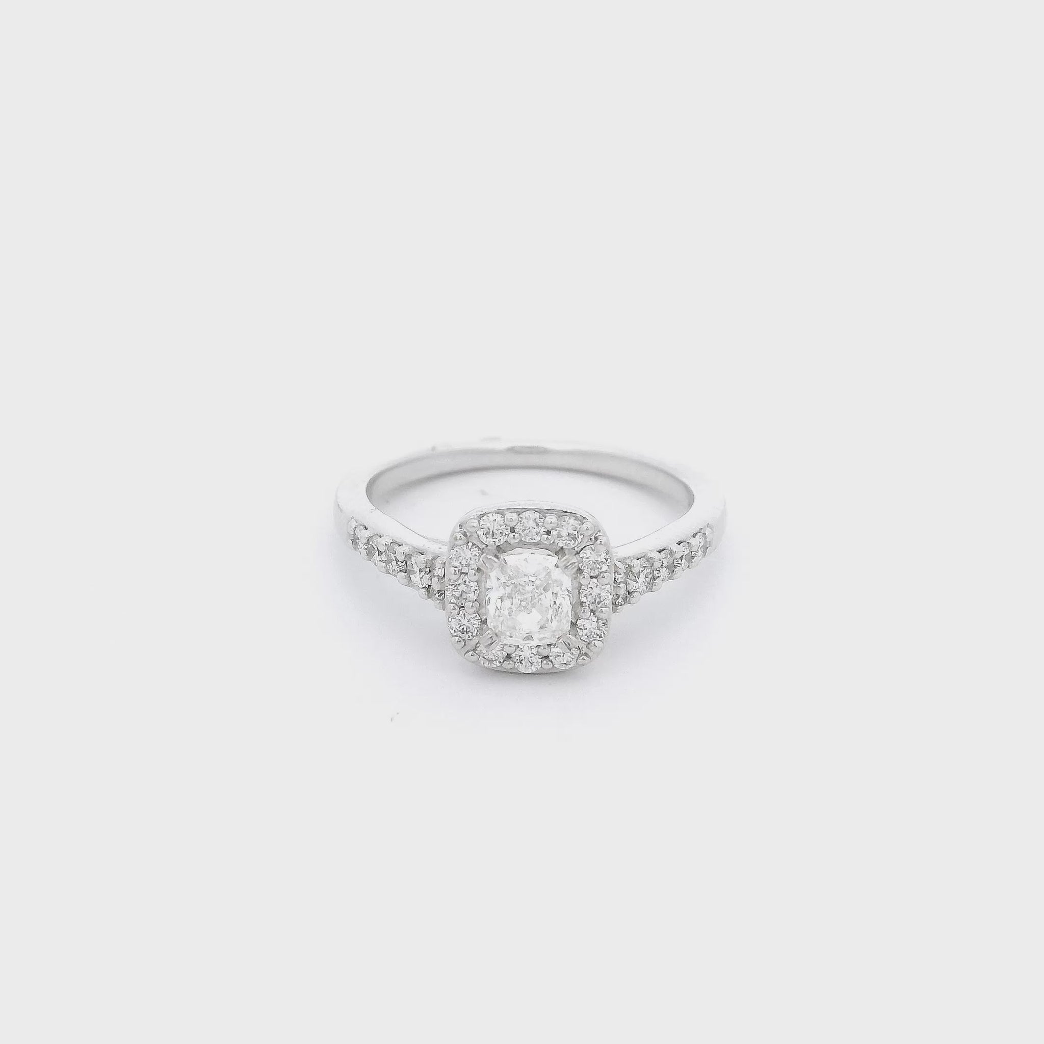 Cushion Cut Diamond set in white gold with diamond accents at Forever Rox Fine Jewelry