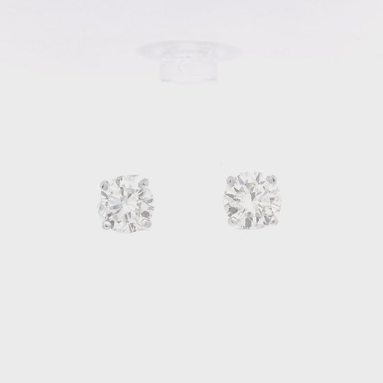 4 Prong 14k White Gold Studs with 3.48ctw of round cut diamonds set in the earrings at Forever Rox Fine Jewelry
