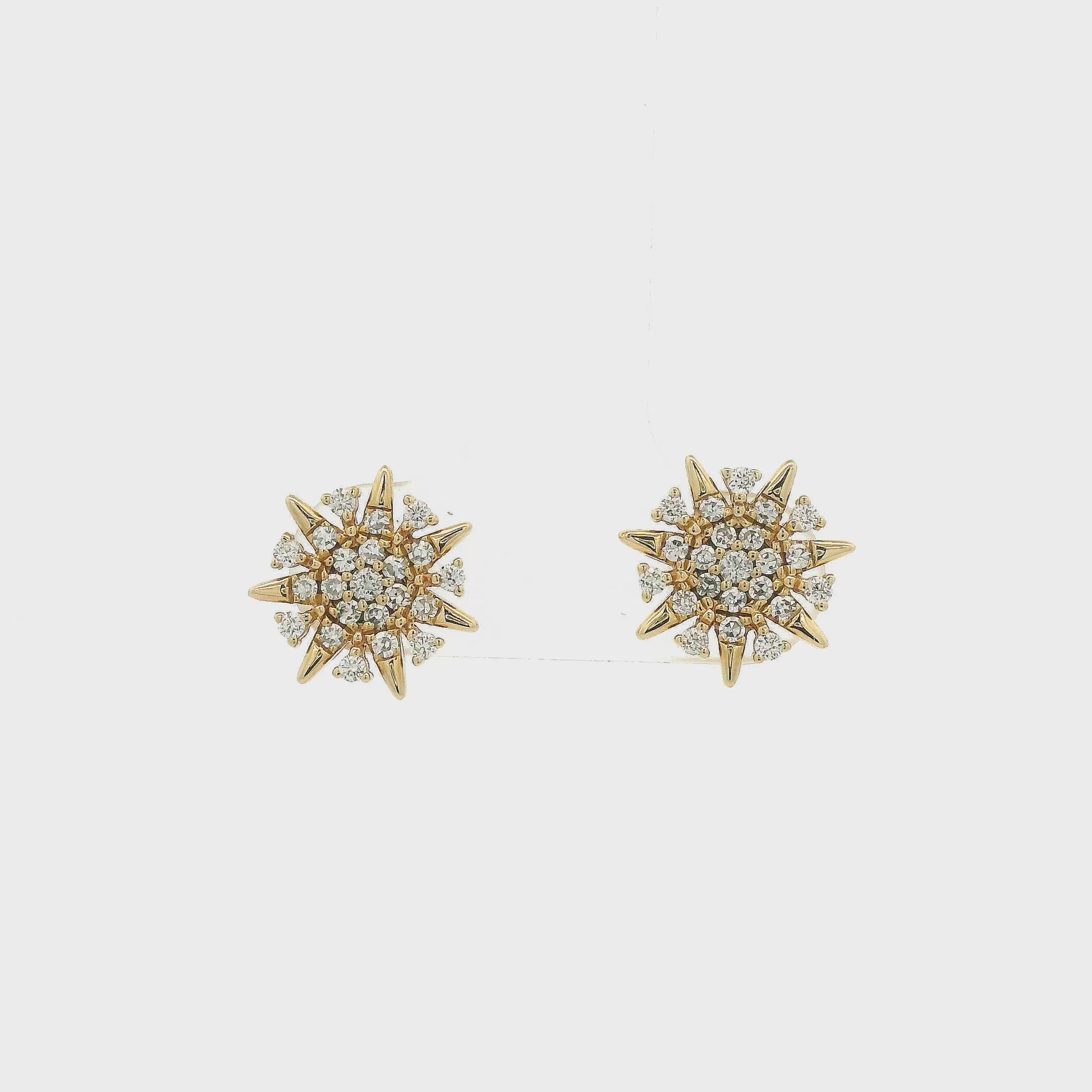 A Pair of Yellow Gold Star Earrings with natural Diamonds at Forever Rox Fine Jewelry, Lake Tahoes Best Jewelry Store