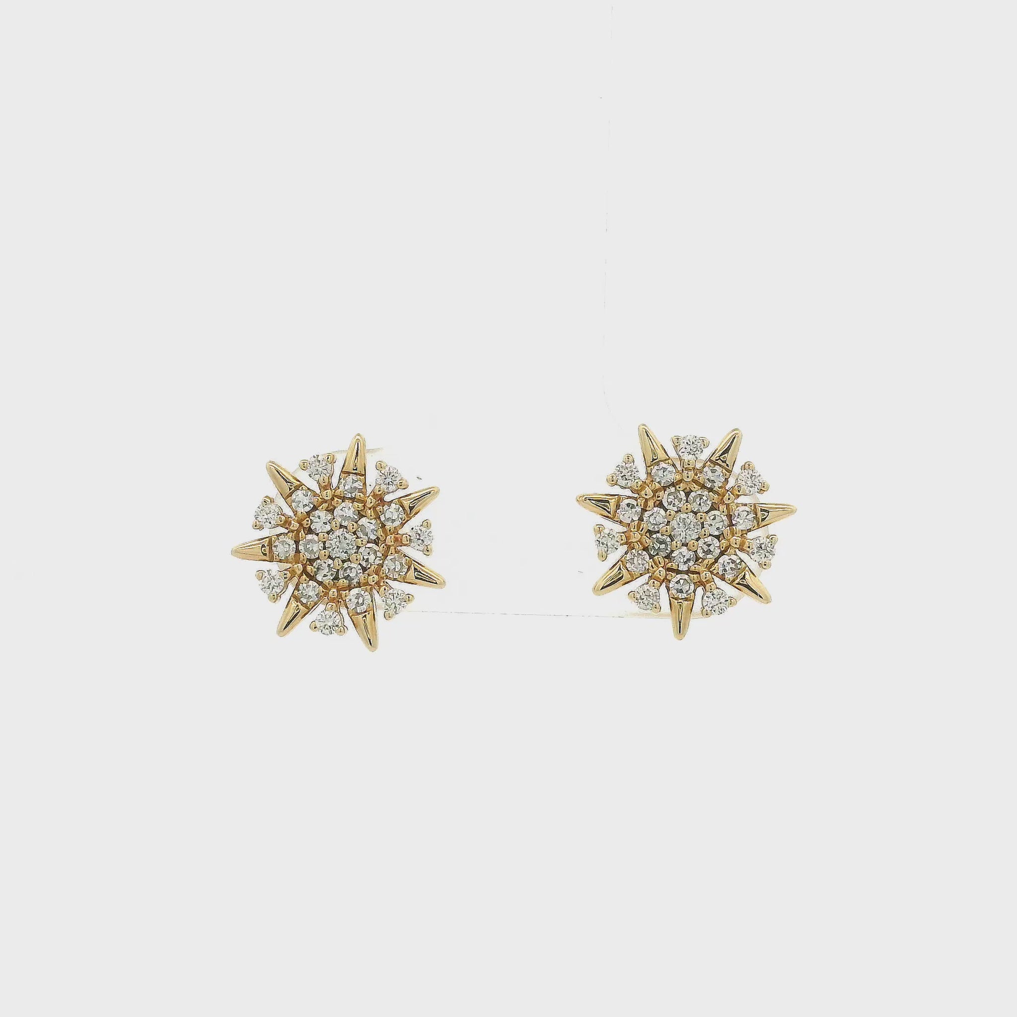 A Pair of Yellow Gold Star Earrings with natural Diamonds at Forever Rox Fine Jewelry, Lake Tahoes Best Jewelry Store