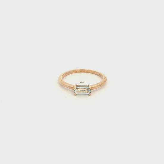 A Yellow Gold Solitaire Ring with a prong set fancy baguette cut natural Blue Topaz in the center at Forever Rox Fine Jewelry, Lake Tahoes Best Jewelry Store