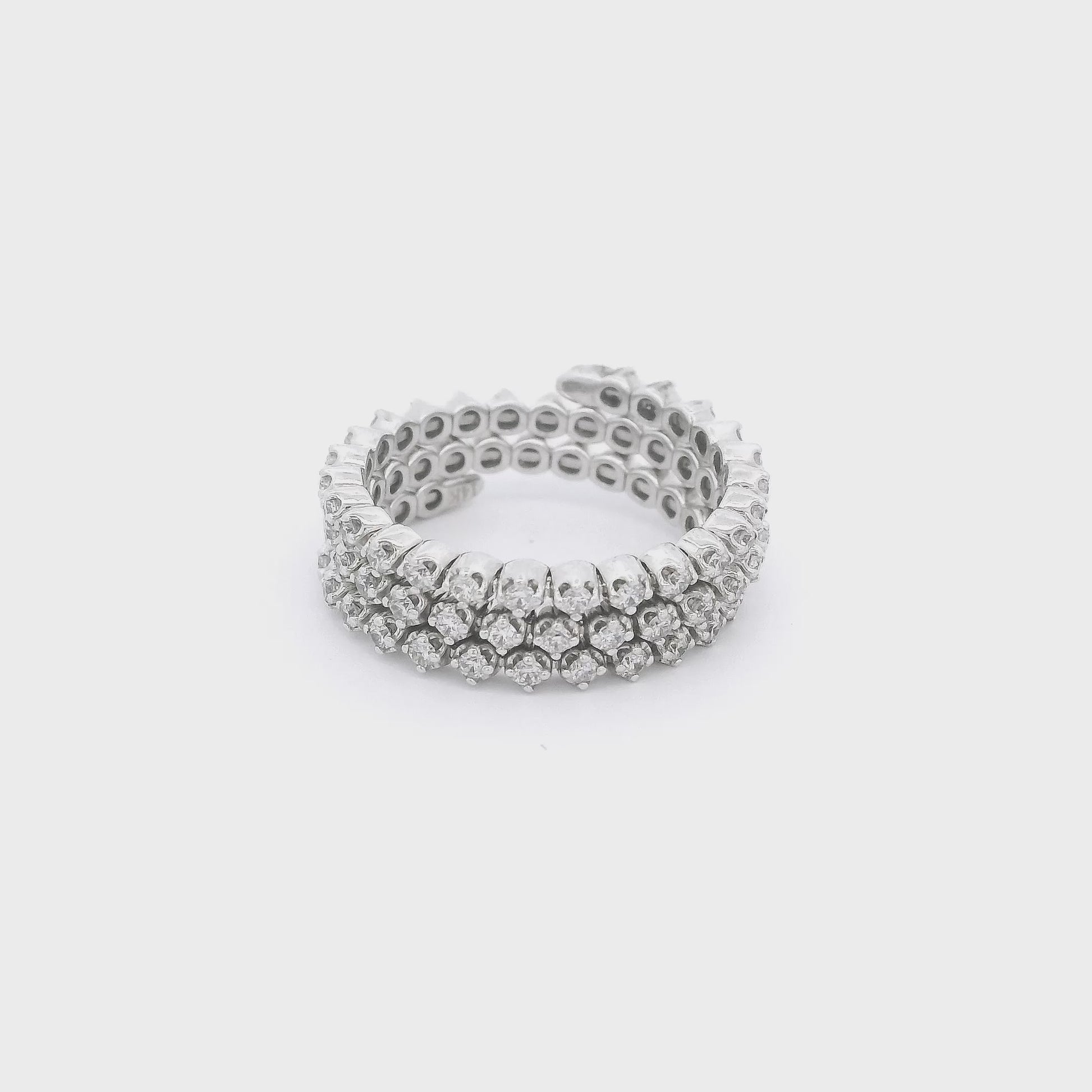 White Gold Flex Ring that has three rows of diamonds and can flex to open at Forever Rox Fine Jewelry