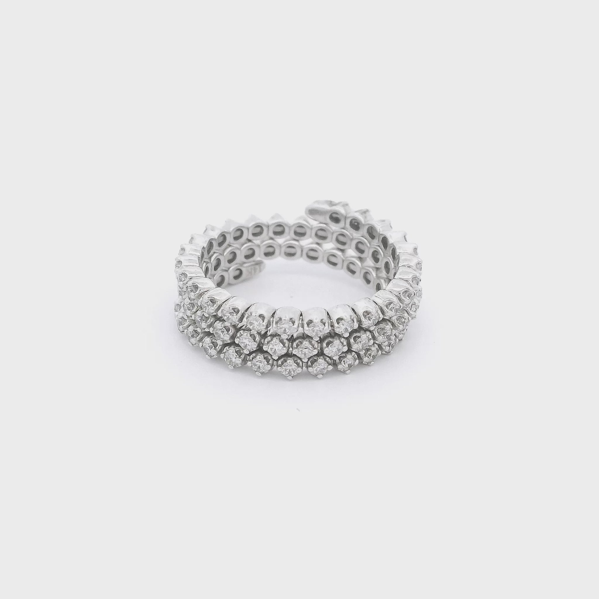 White Gold Flex Ring that has three rows of diamonds and can flex to open at Forever Rox Fine Jewelry