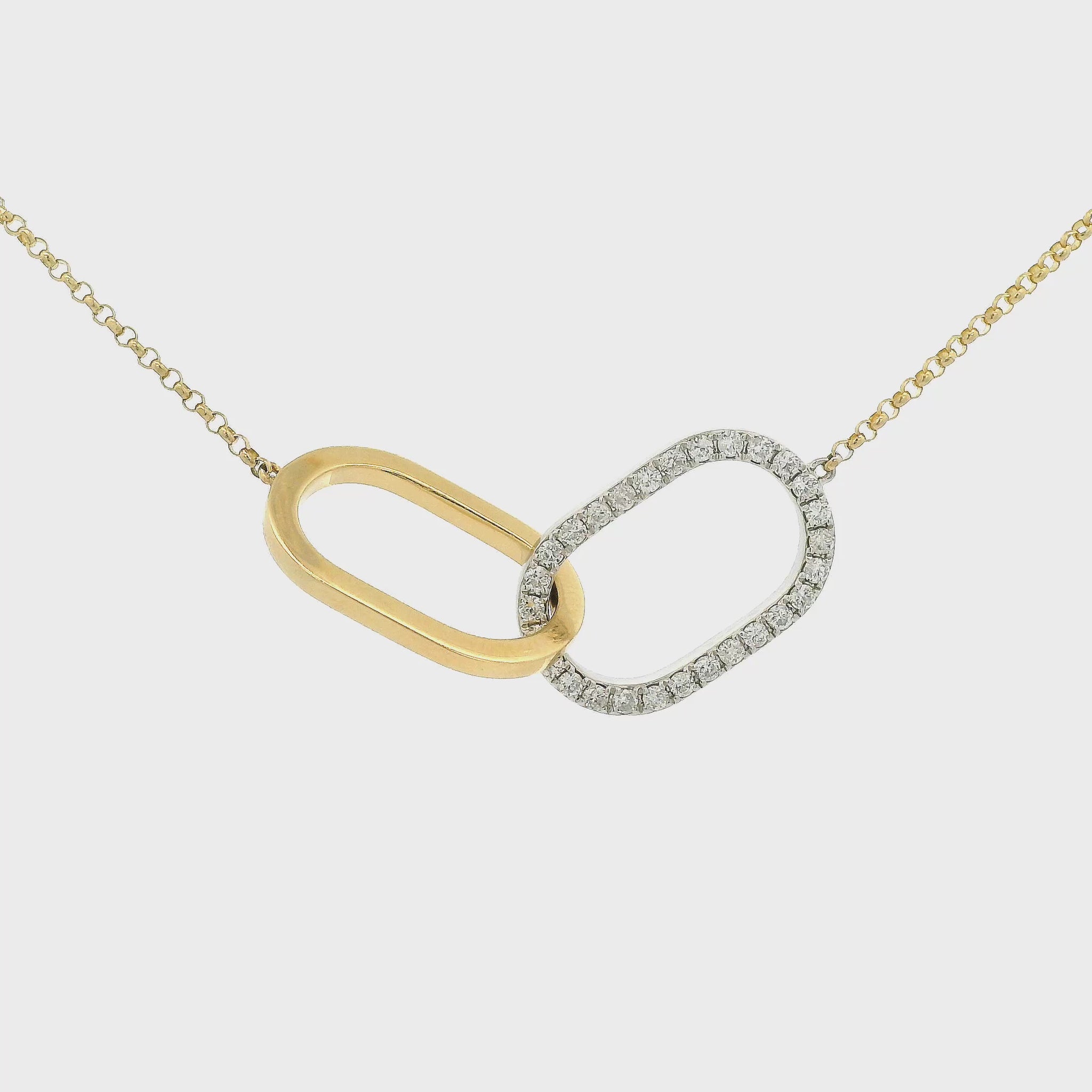 A Yellow & White Gold Pendant with half of the interlinked pieces set with Diamonds and the other half just yellow gold at Forever Rox Fine Jewelry, Lake Tahoes Best Jewelry Store