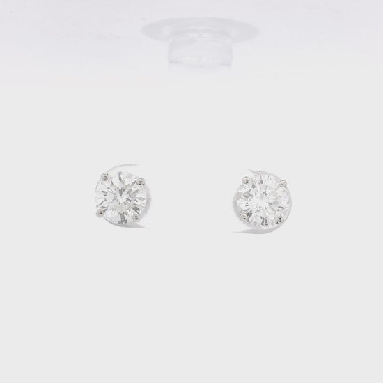 4 Prong White Gold Studs with 2.04ctw of orund cut diamonds set in the earrings at Forever Rox Fine Jewelry