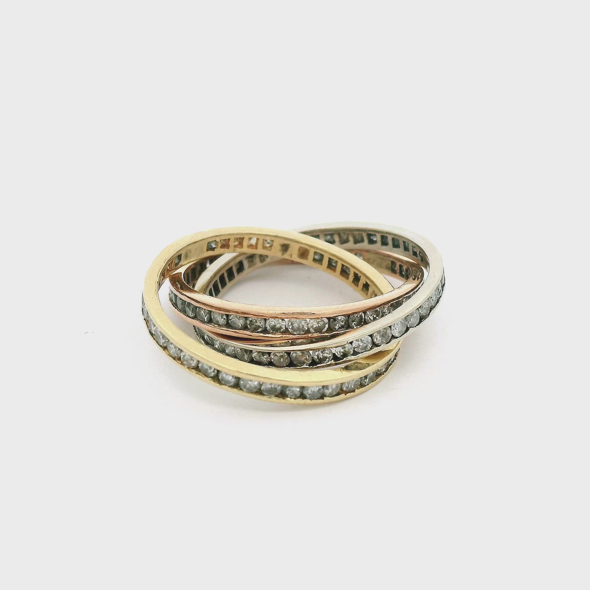 Three Different Gold Tone Diamond Bands Interlocked At Forever Rox Fine Jewelry