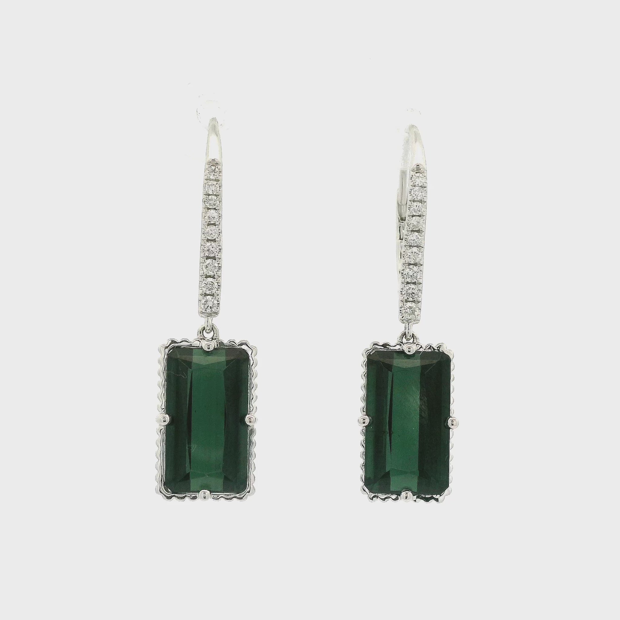 A Pair of White Gold Dangles with prong set emerald cut green Tourmalines in the center with diamond hoops at Forever Rox Fine Jewelry, Lake Tahoes Best Jewelry Store
