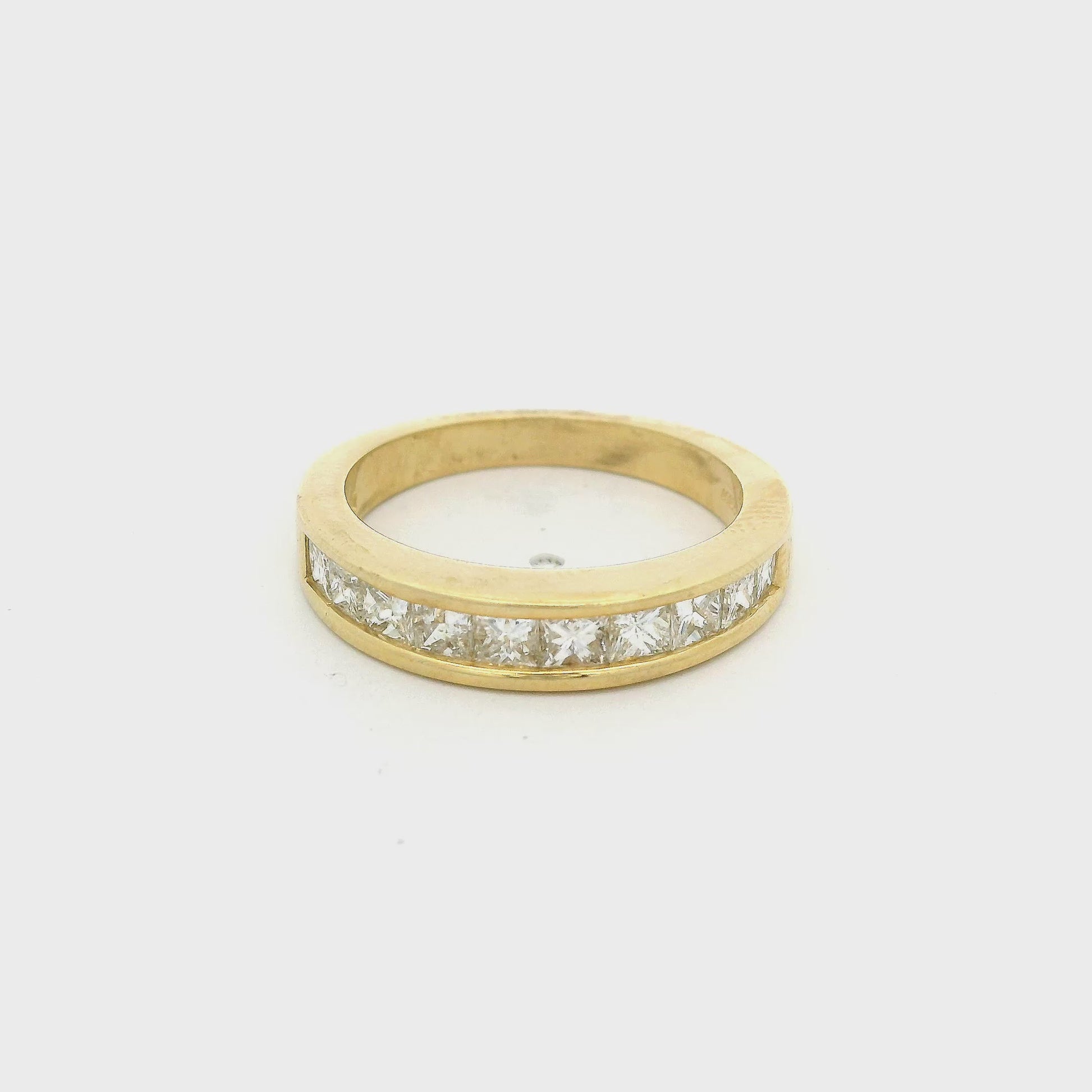Yellow Gold Band channel set with 10 princess cut diamonds at Forever Rox Fine Jewelry