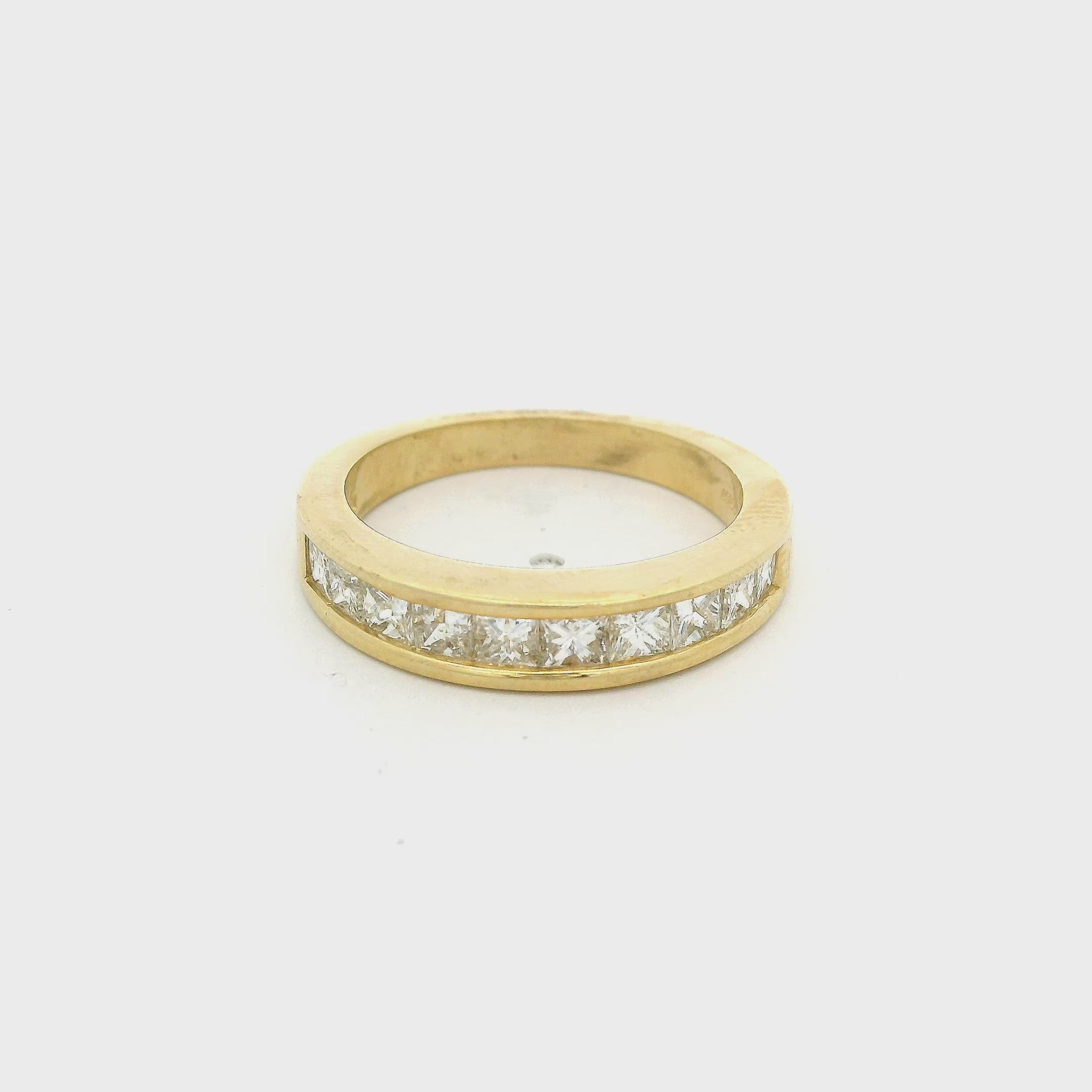 Yellow Gold Band channel set with 10 princess cut diamonds at Forever Rox Fine Jewelry