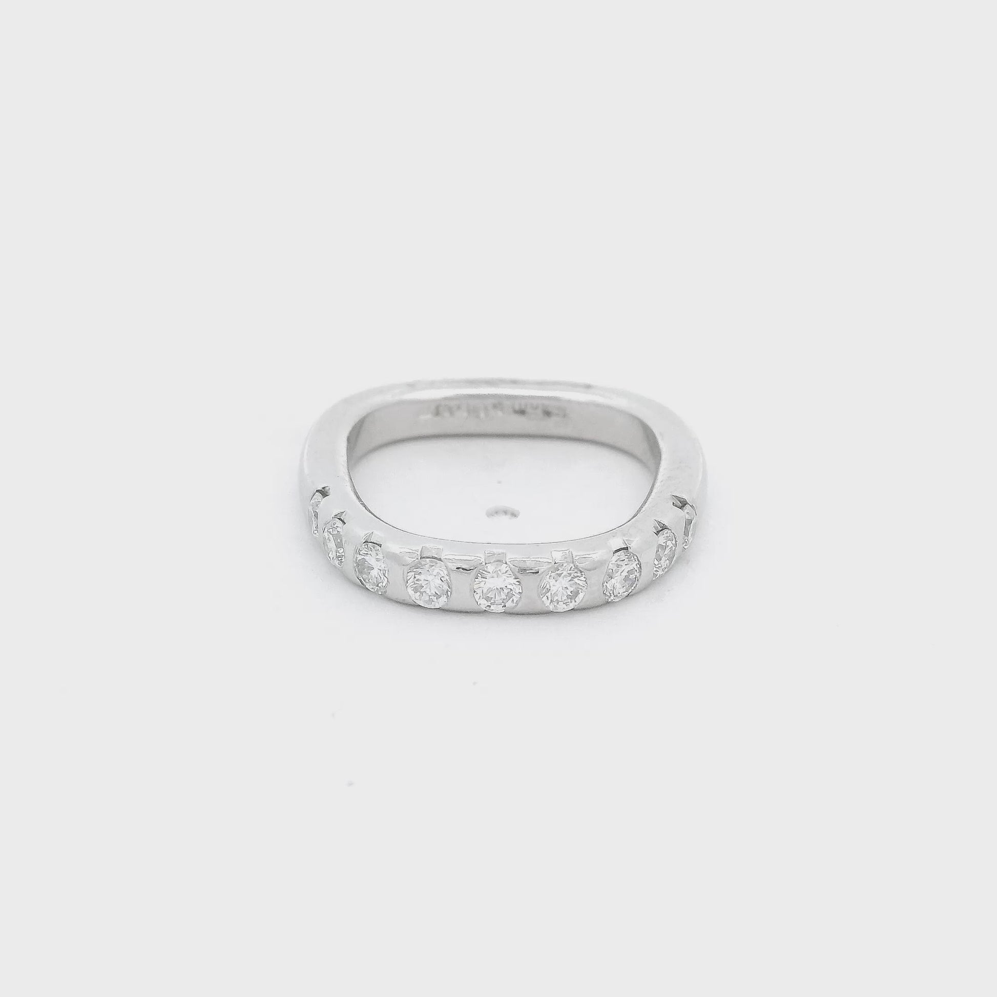 Platinum Stuart Moore Signed Band with a square shank annine flush set round cut diamonds at Forever Rox Fine Jewelry