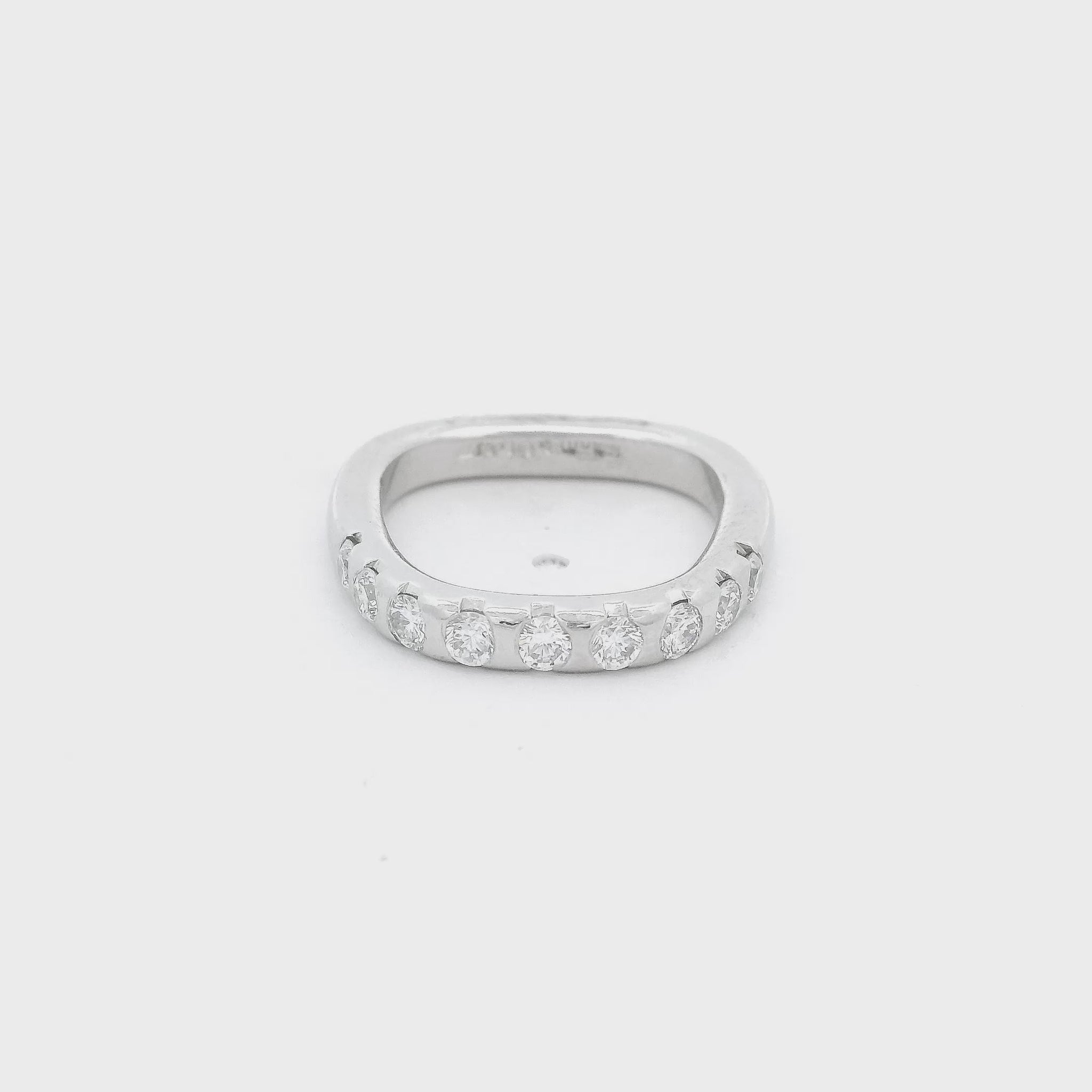 Platinum Stuart Moore Signed Band with a square shank annine flush set round cut diamonds at Forever Rox Fine Jewelry