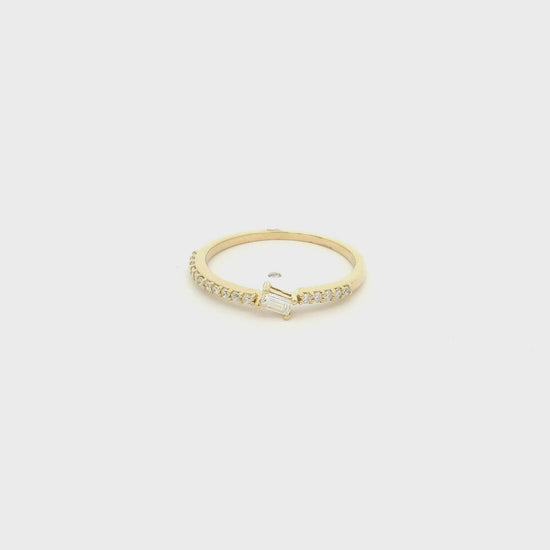 A Yellow Gold Ring with a offset prong set baguette cut natural Diamond in the center with diamonds down the shank at Forever Rox Fine Jewelry, Lake Tahoes Best Jewelry Store
