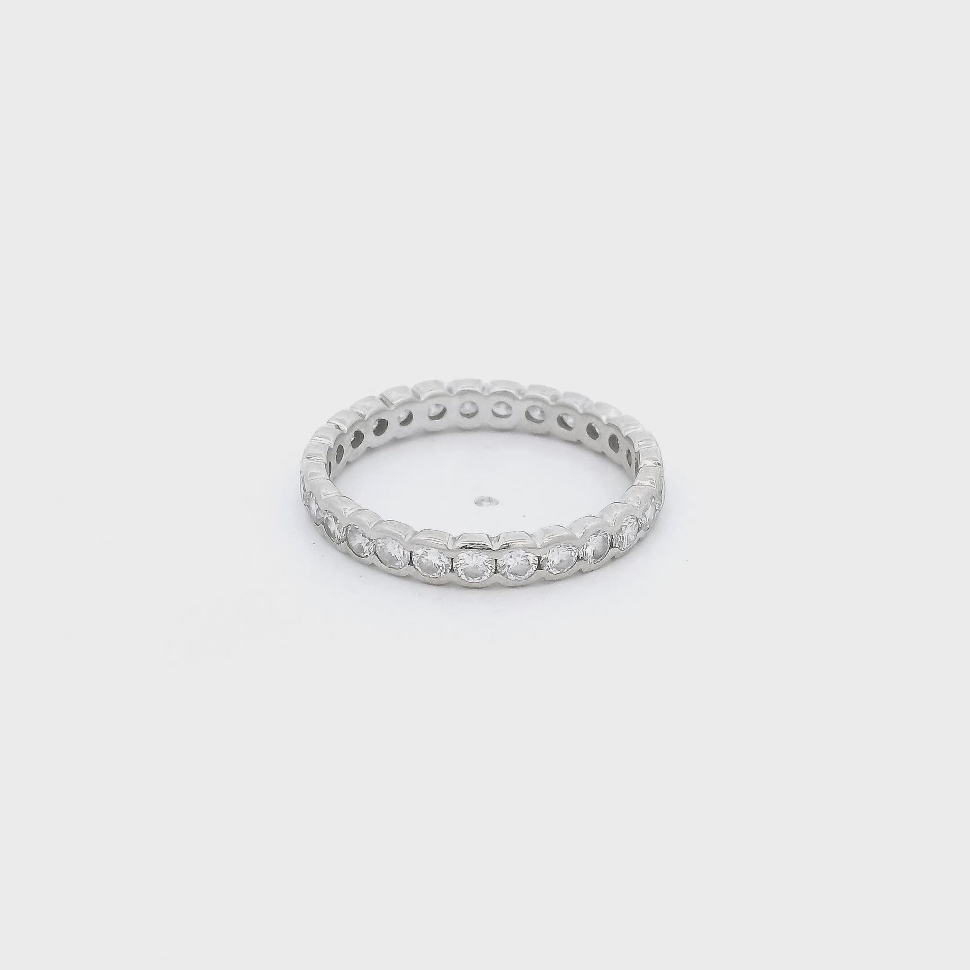 A White Gold Eternity Band with channel set round cut Diamonds at Forever Rox Fine Jewelry, Lake Tahoes Best Jewelry Store