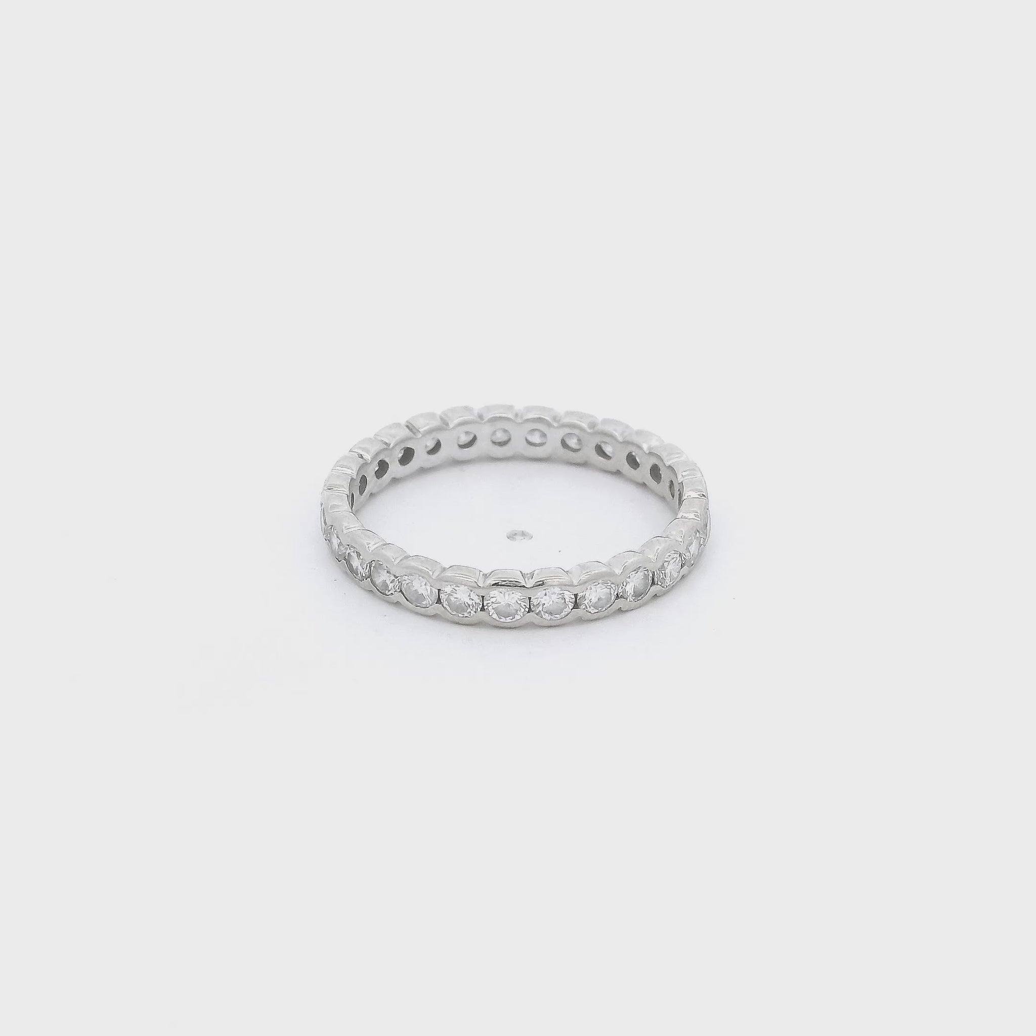A White Gold Eternity Band with channel set round cut Diamonds at Forever Rox Fine Jewelry, Lake Tahoes Best Jewelry Store