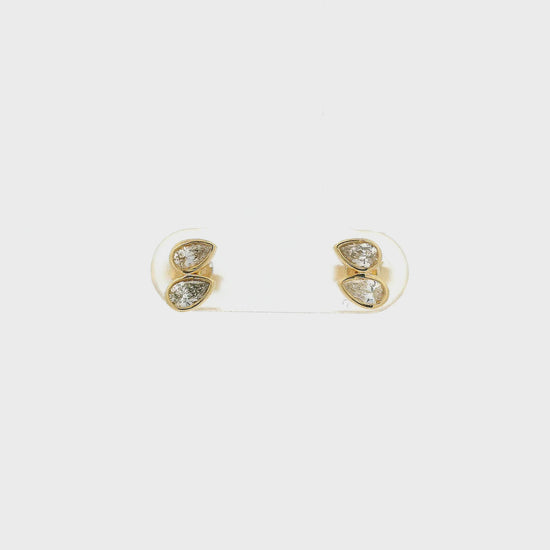 A Pair of Yellow Gold Stud Earrings with two bezel set pear cut natural Diamonds in each earring at Forever Rox Fine Jewelry, Lake Tahoes Best Jewelry Store
