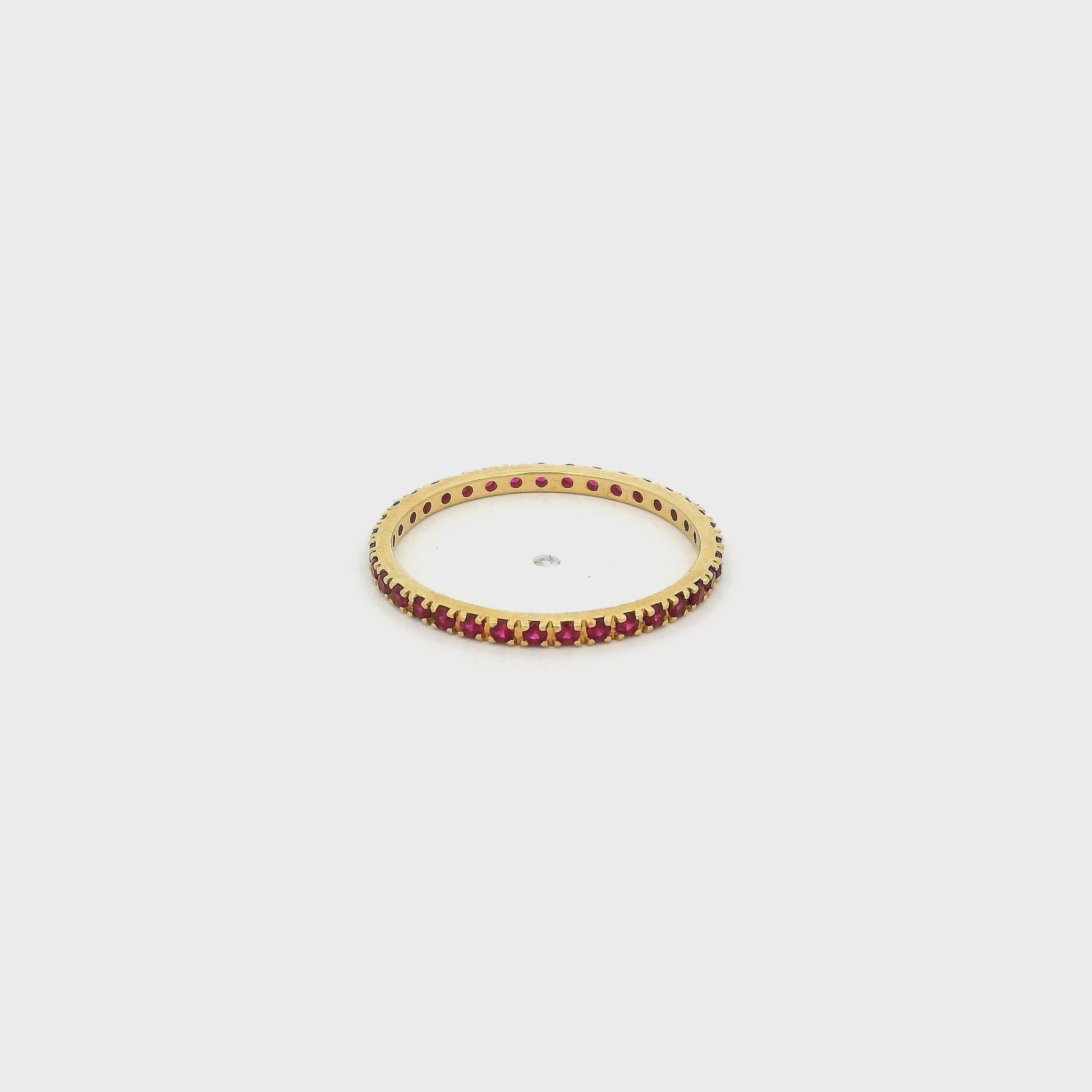 A Yellow Gold Eternity Band with natural Rubies all the way around at Forever Rox Fine Jewelry, Lake Tahoes Best Jewelry Store