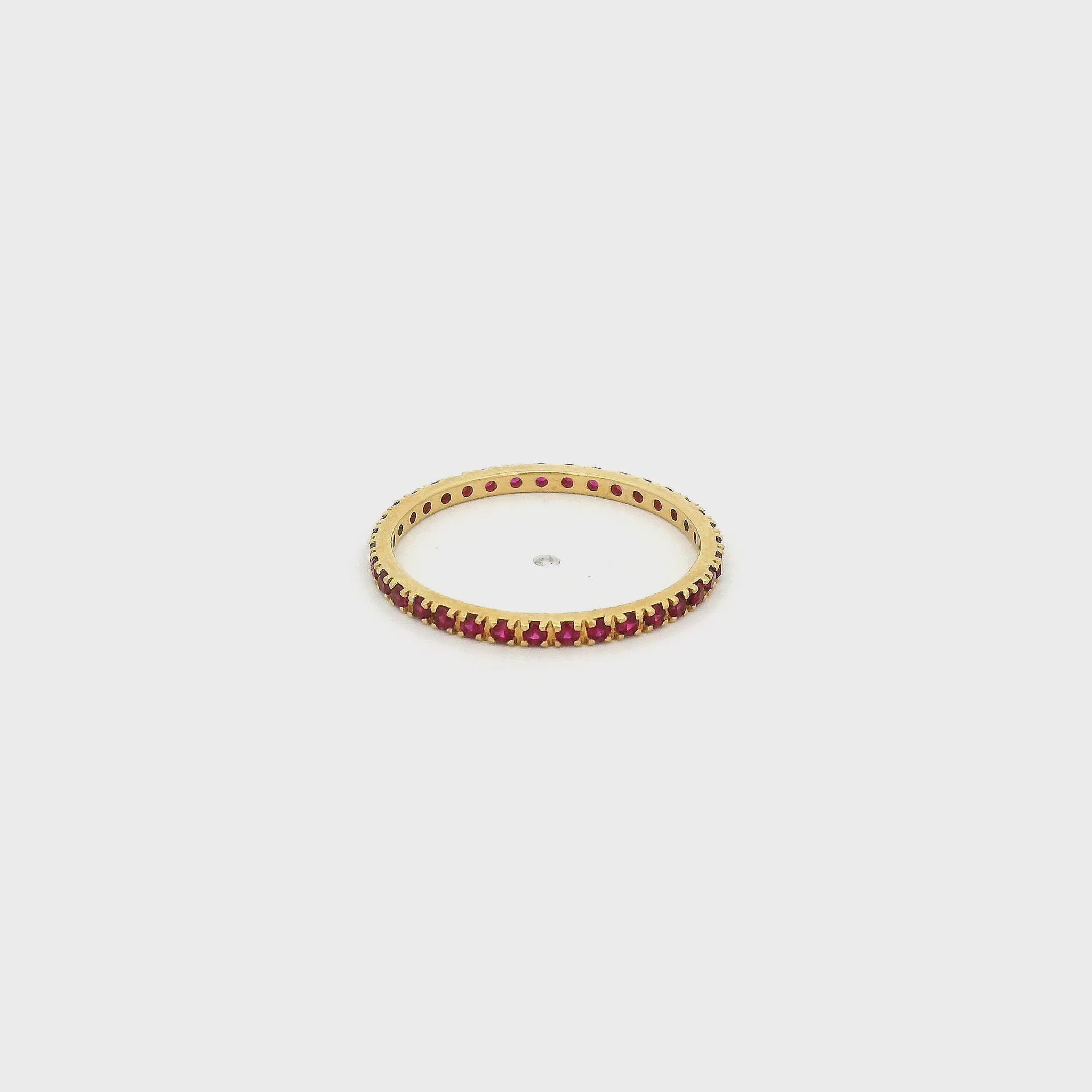 A Yellow Gold Eternity Band with natural Rubies all the way around at Forever Rox Fine Jewelry, Lake Tahoes Best Jewelry Store