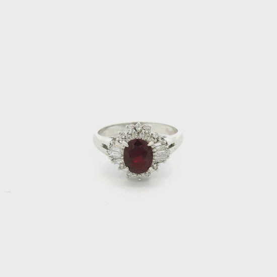 A Platinum Ring with a prong set oval cut natural Ruby in the center with Baguette and round cut diamonds at Forever Rox Fine Jewelry, Lake Tahoes Best Jewelry Store