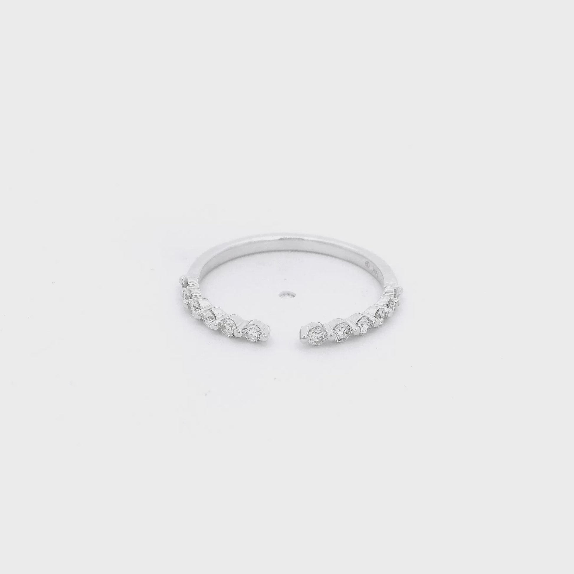White Gold band that is split down the center with diamonds on either side at Forever Rox Fine Jewlery