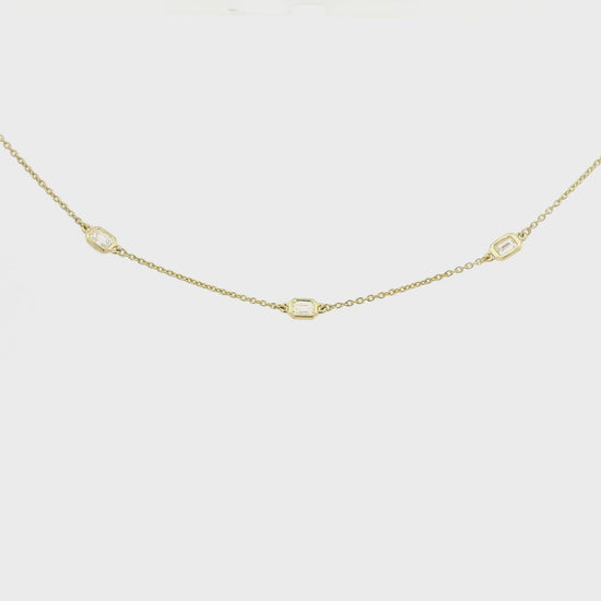 A Yellow Gold Necklace with bezel set emerald cut natural Diamondsset in the chain at Forever Rox Fine Jewelry, Lake Tahoes Best Jewelry Store