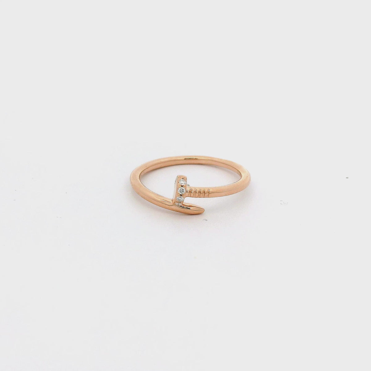A Rose Gold Nail Ring with natural diamonds at Forever Rox Fine Jewelry, Lake Tahoes Best Jewelry Store
