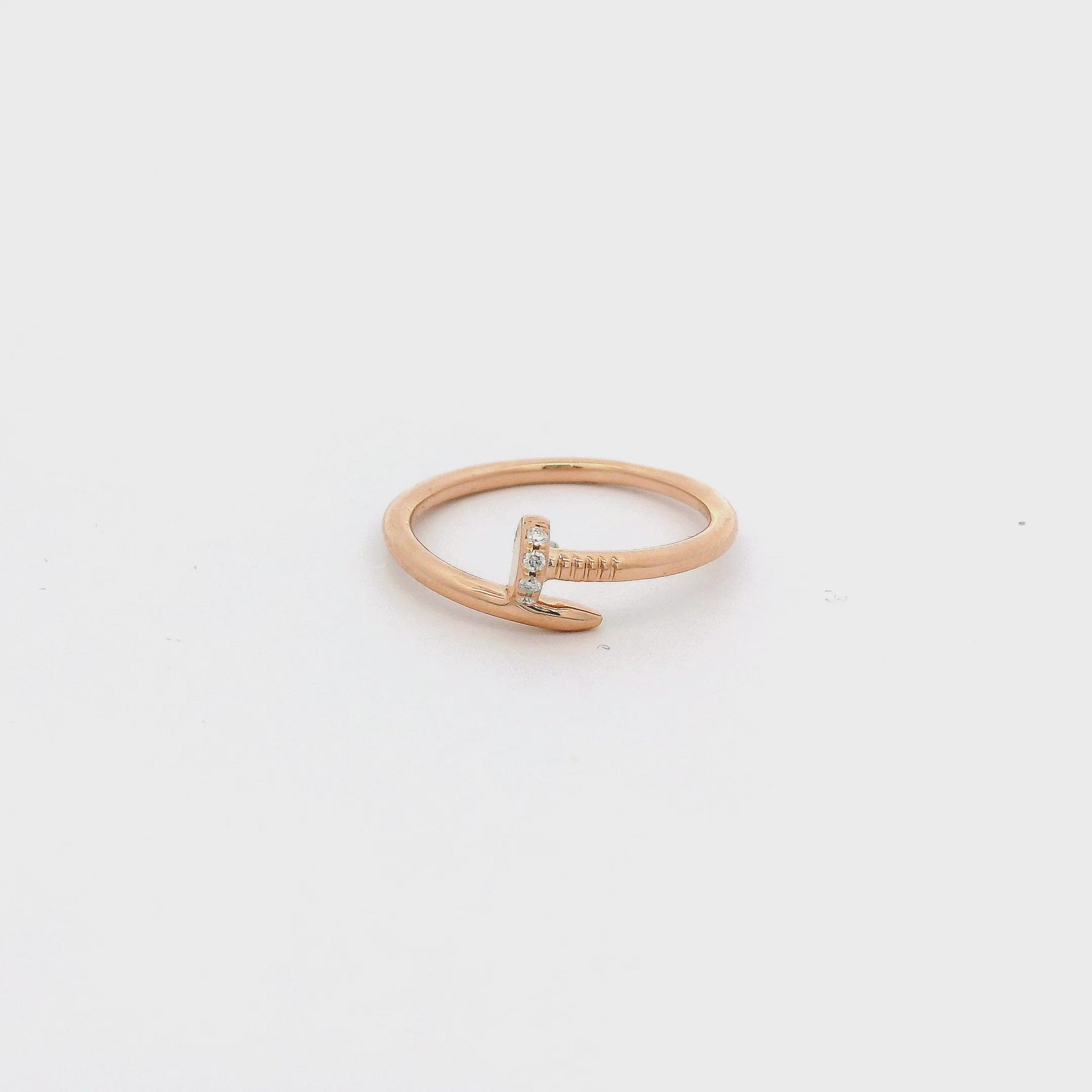 A Rose Gold Nail Ring with natural diamonds at Forever Rox Fine Jewelry, Lake Tahoes Best Jewelry Store
