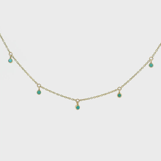 Turquoise Studded Links Hanging From a Necklace at Forever Rox Fine Jewelry