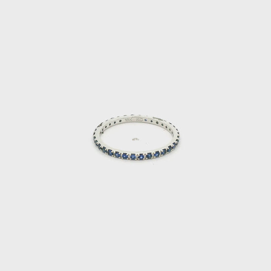 A White Gold Eternity Band with natural Light Blue Sapphires all the way around at Forever Rox Fine Jewelry, Lake Tahoes Best Jewelry Store