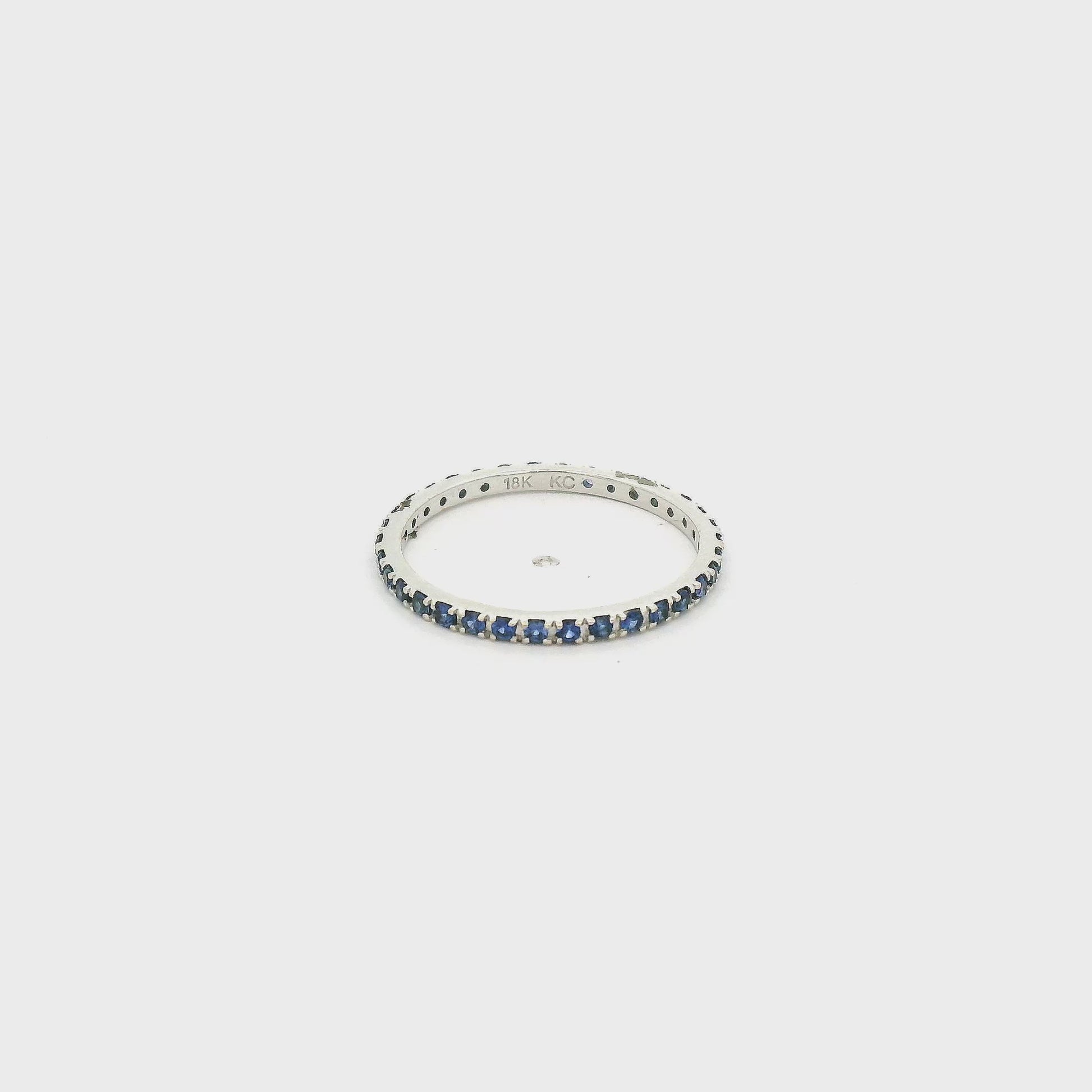 A White Gold Eternity Band with natural Light Blue Sapphires all the way around at Forever Rox Fine Jewelry, Lake Tahoes Best Jewelry Store