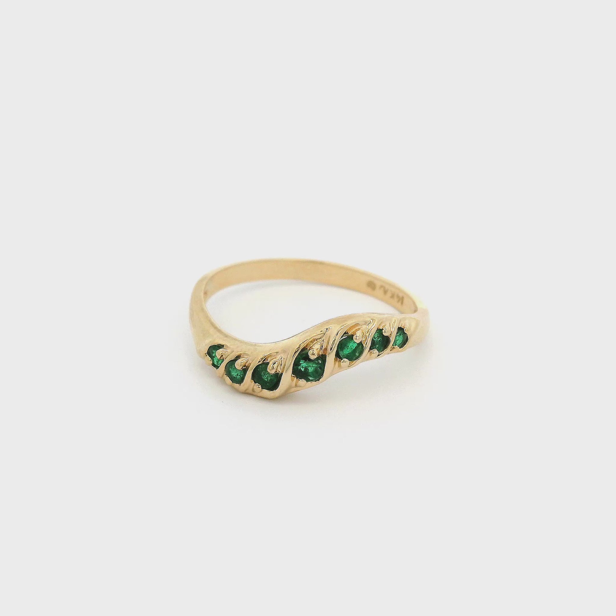 Yellow Gold Curved Stackable Band with seven emeralds at Forever Rox Fine Jewelry