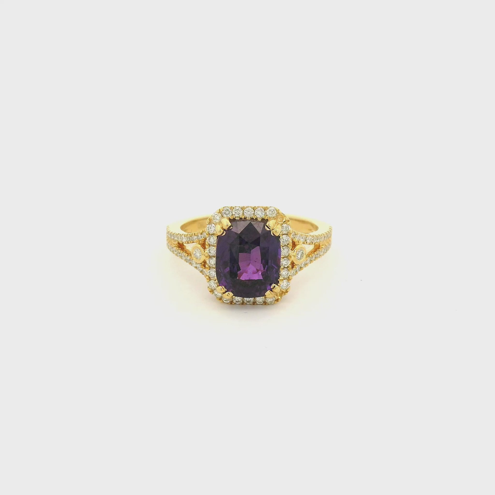 A Yellow Gold Ring with a prong set cushion cut NO Heat natural Purple Sapphire in the center with diamond accents at Forever Rox Fine Jewelry, Lake Tahoes Best Jewelry Store
